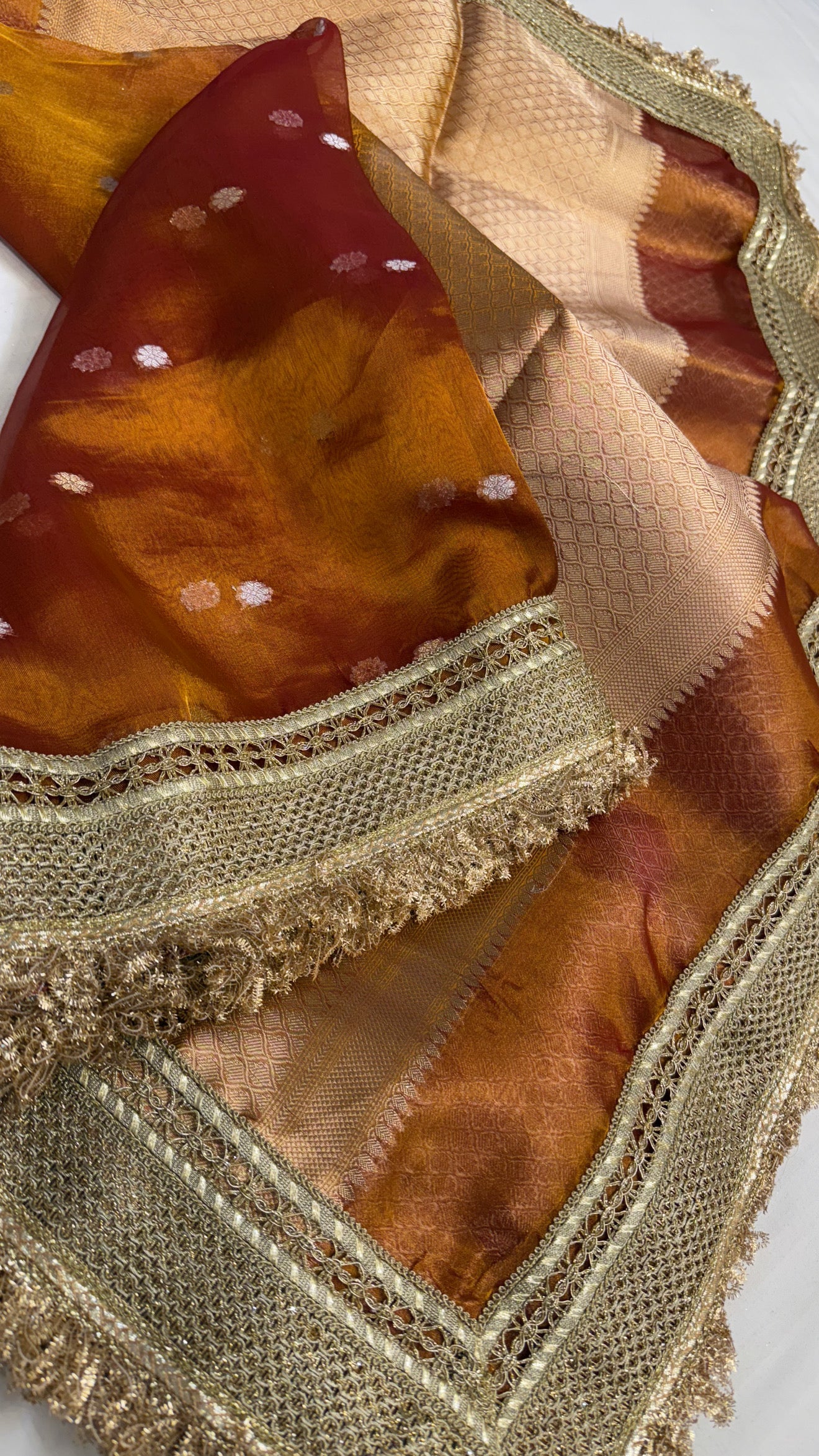 Maharani burnt orange tissue silk kadhwa buti saree