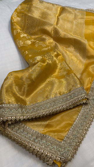 Maharani haldi yellow tissue silk jungla kadhwa saree