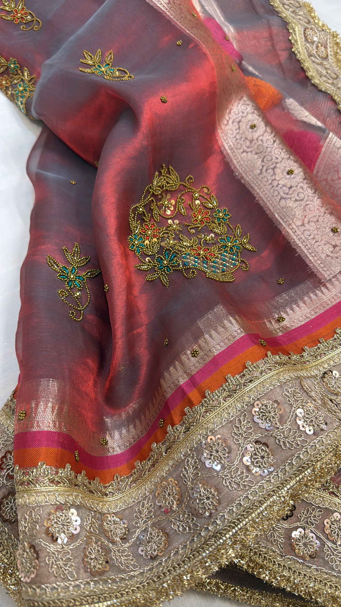 Husn dusty red antique zari hand embroidered tissue silk saree