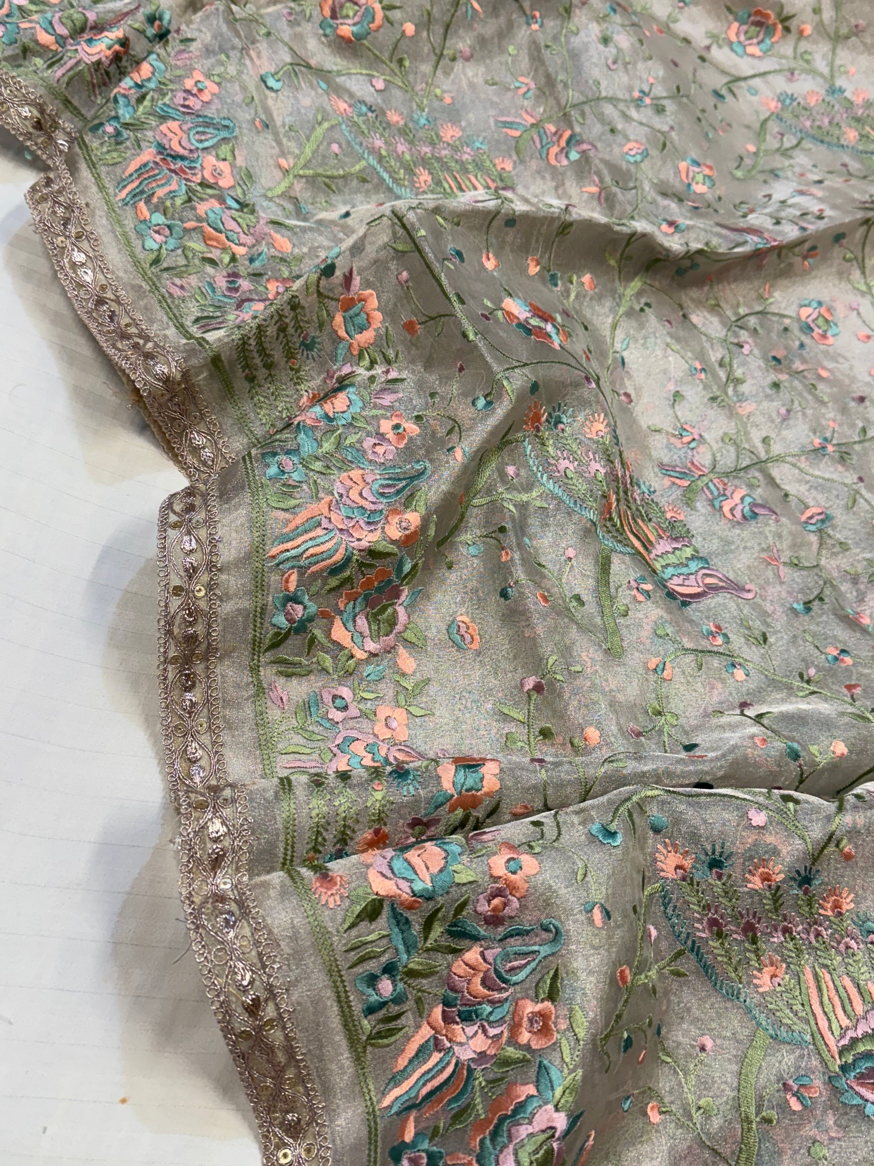 “Parsi gara” inspired tissue silk heavy resham work hand embroidered saree