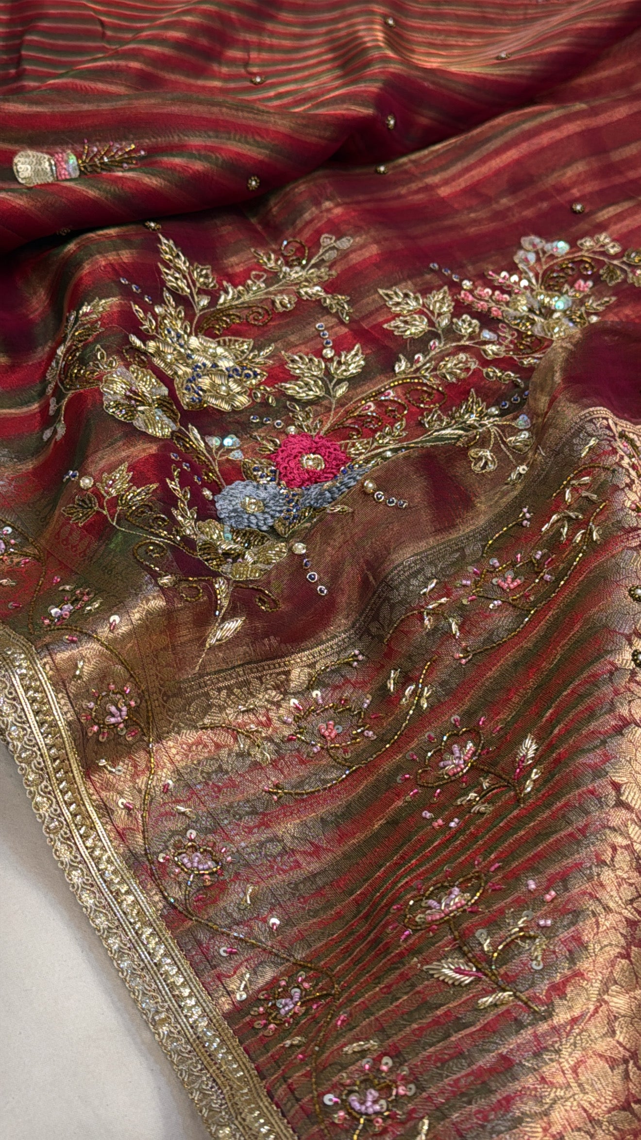 Husn tissue silk multicoloured striped kadhwa hand embroidered saree