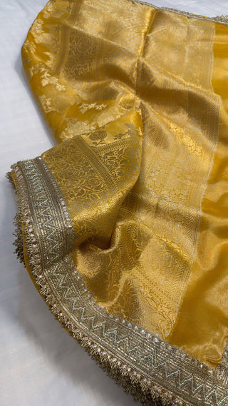 Maharani haldi yellow tissue silk jungla kadhwa saree