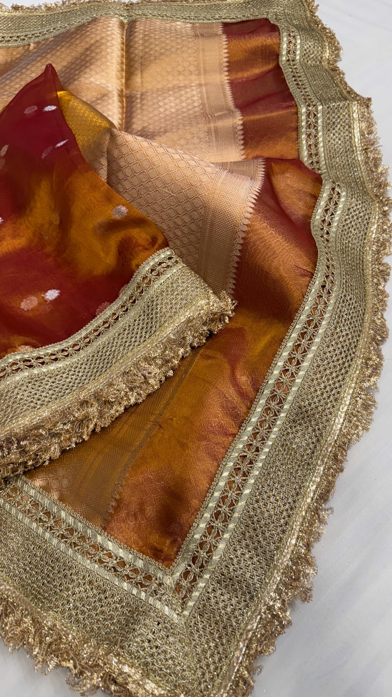 Maharani burnt orange tissue silk kadhwa buti saree