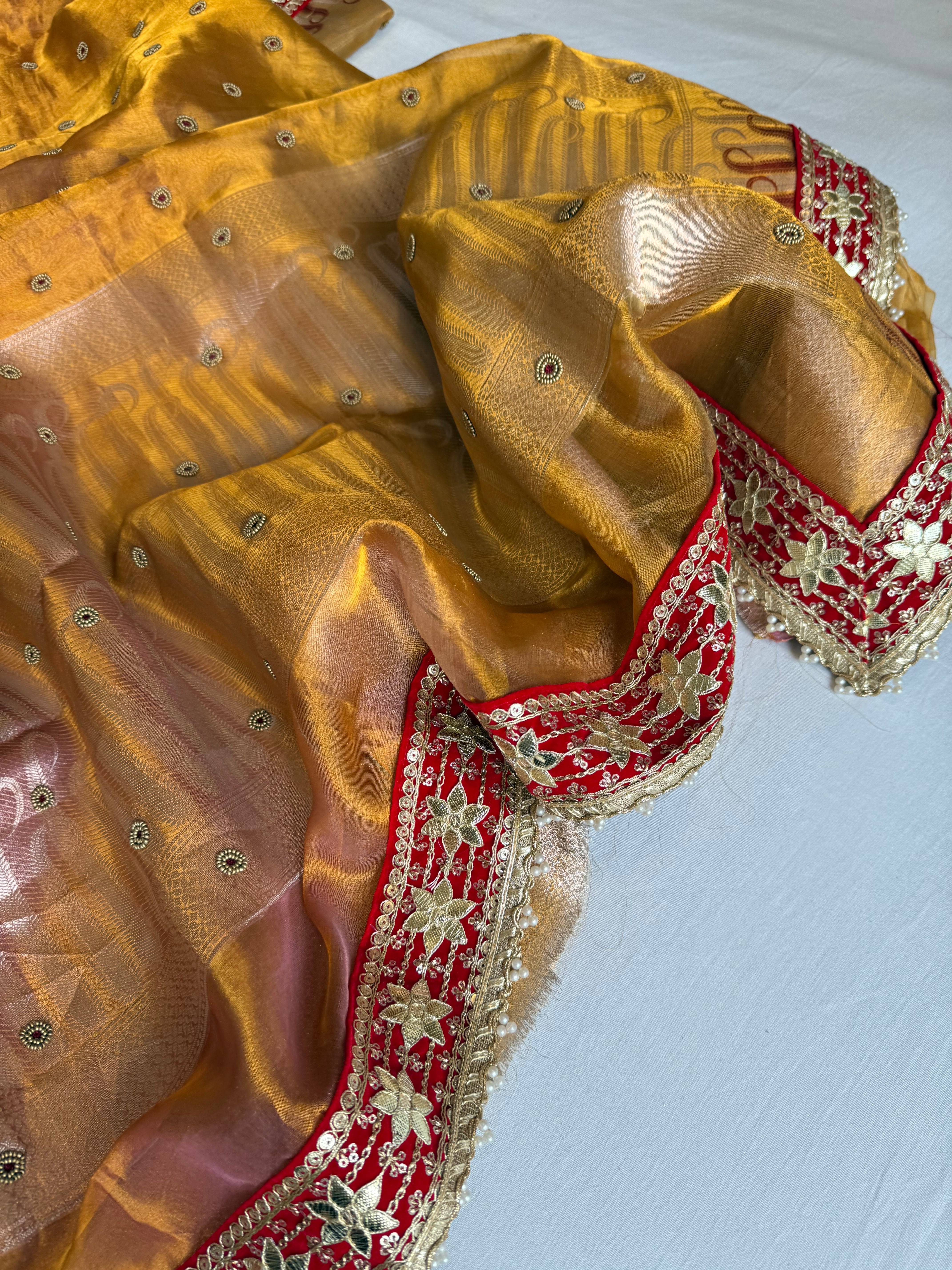 Kanjivaram gold tissue silk red meenakari hand embroidered kadhwa saree