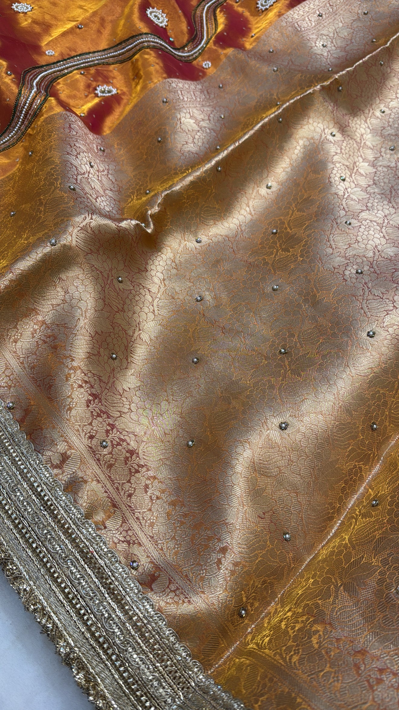 Kanjivaram orange zardozi work husn tissue silk hand embroidered saree