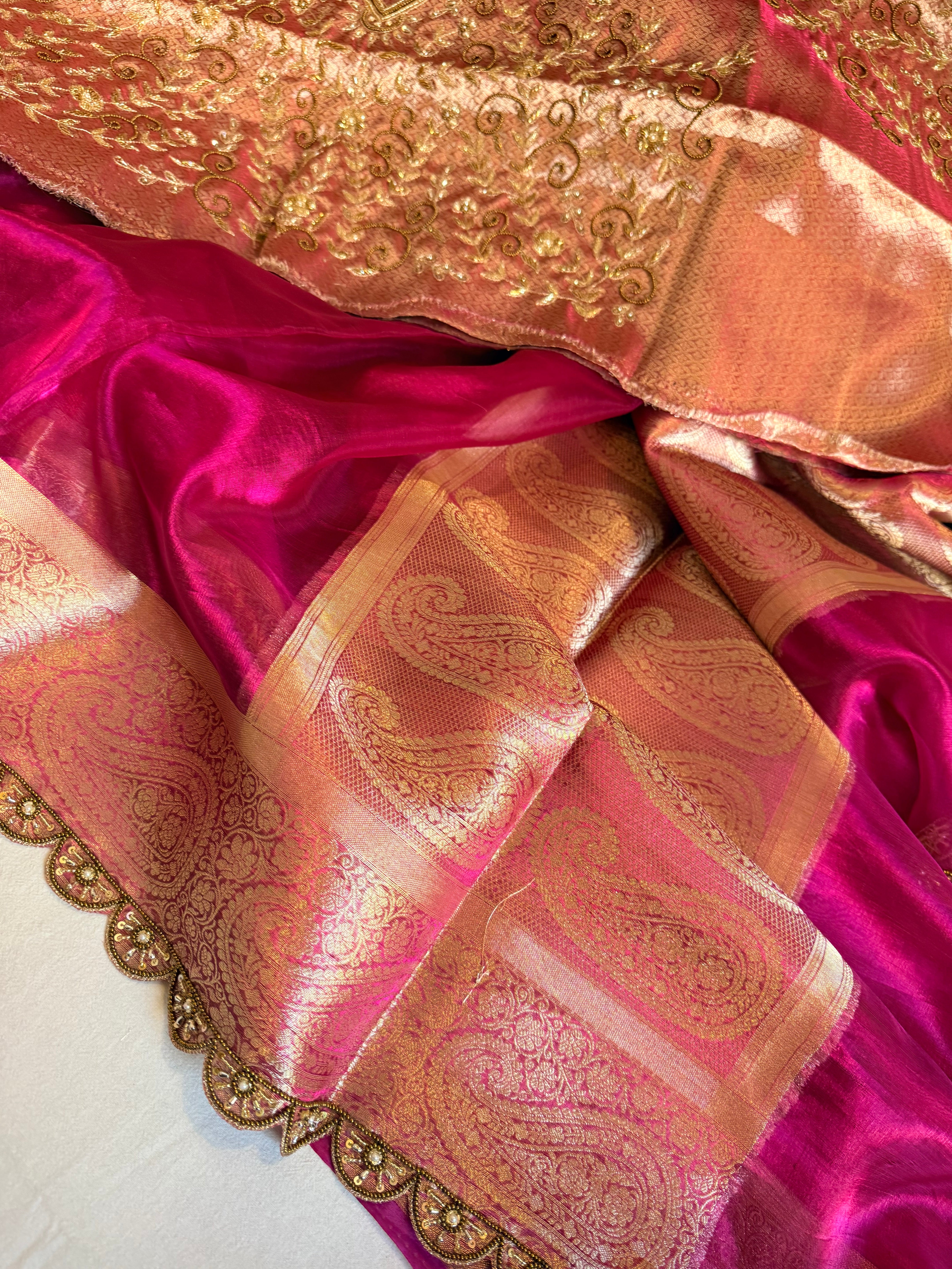 Metallic rani pink husn tissue silk hand embroidered saree with heavy blouss