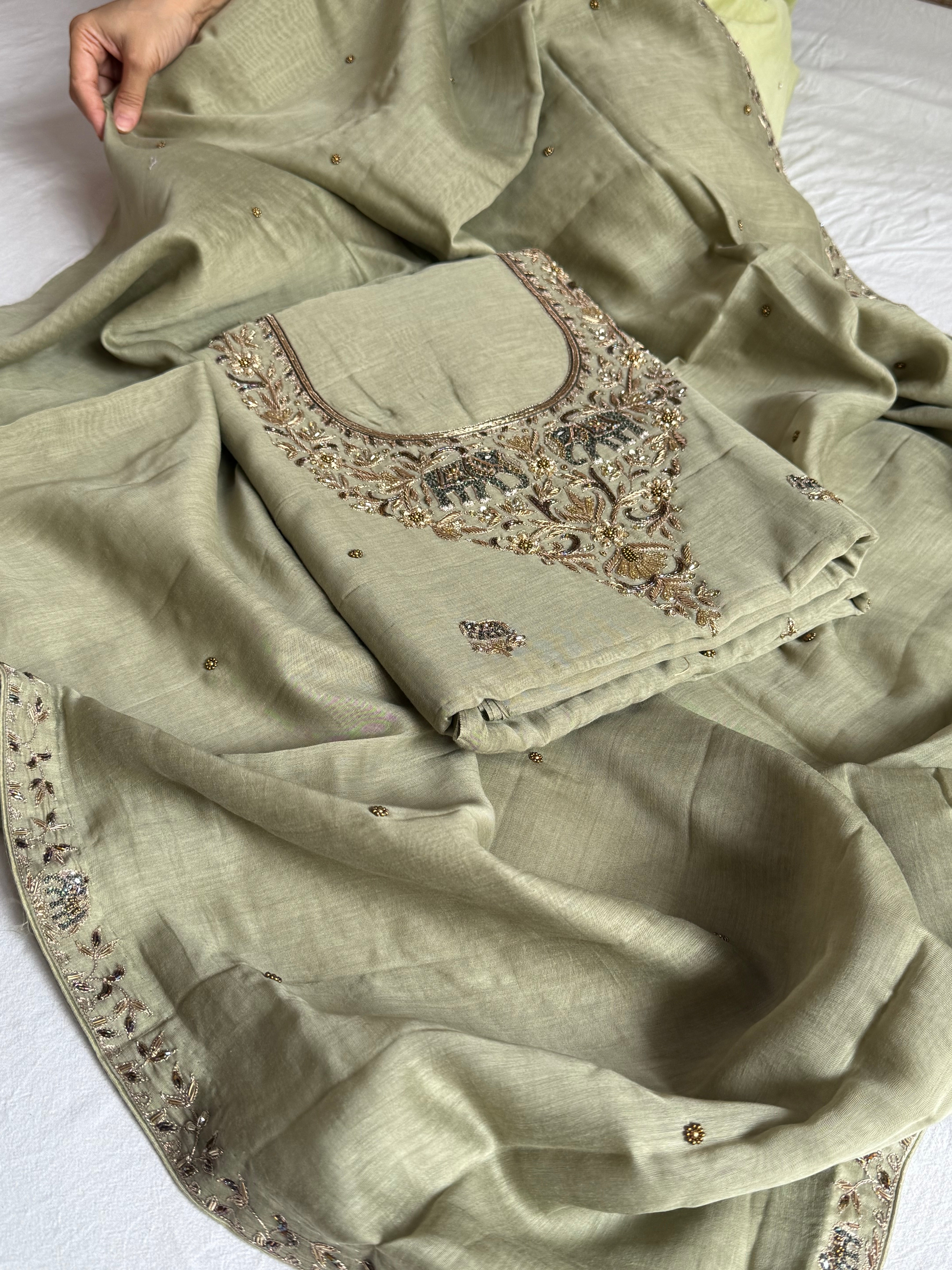 Banarasi formal wear mul cotton sage green hand embroidered kadhwa suit set with mul cotton hand embroidered duppata