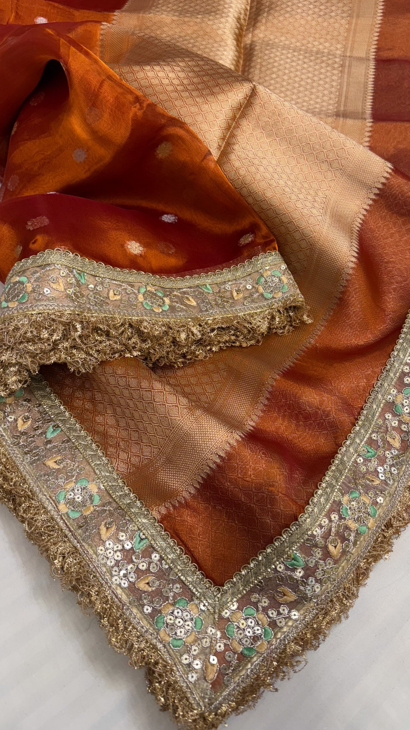 Maharani deep orange tissue silk kadhwa buti saree