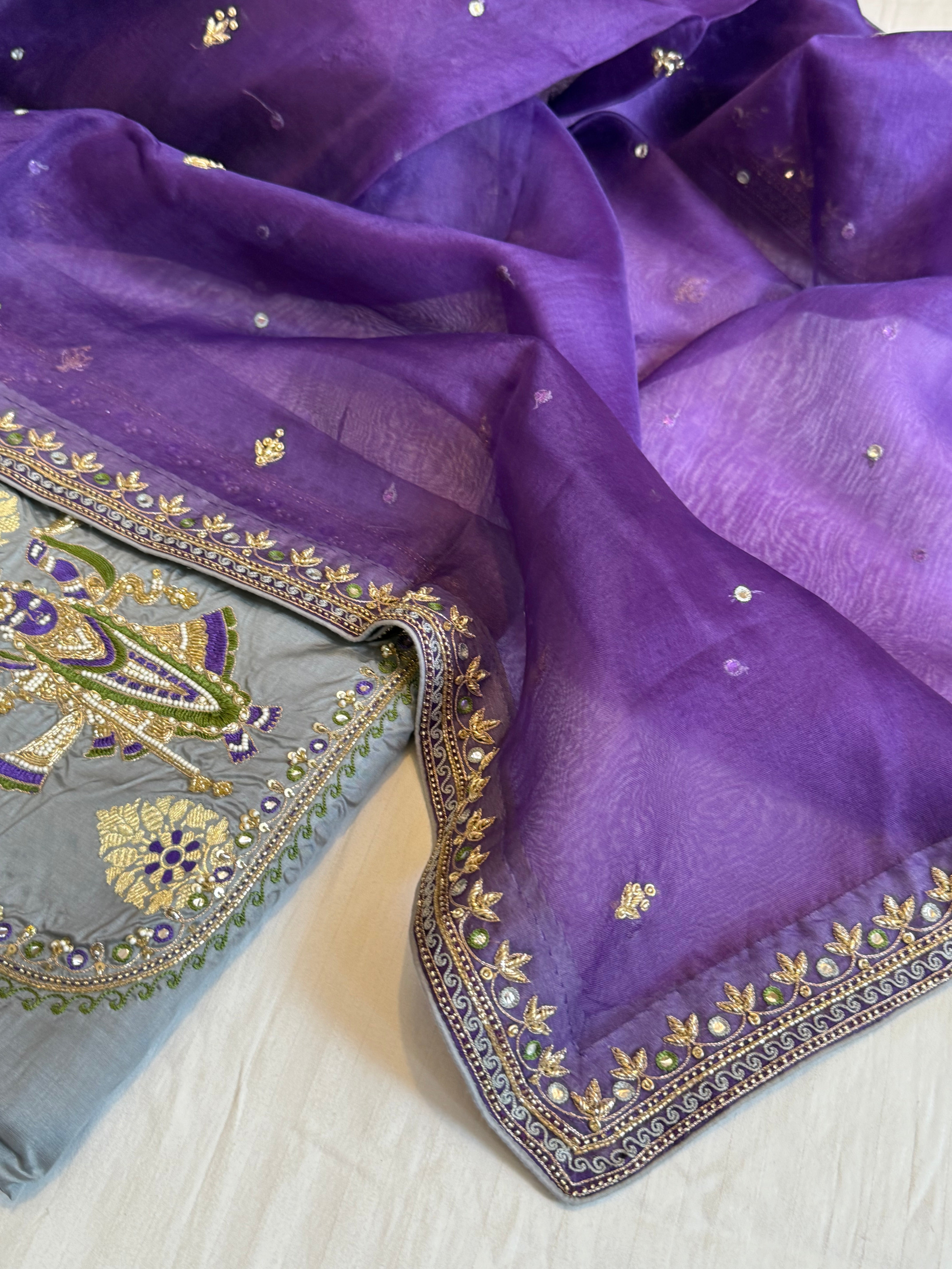 Lavender- grey shade katan silk “shrinathji” motif inspired katan silk hand embroidered suit set