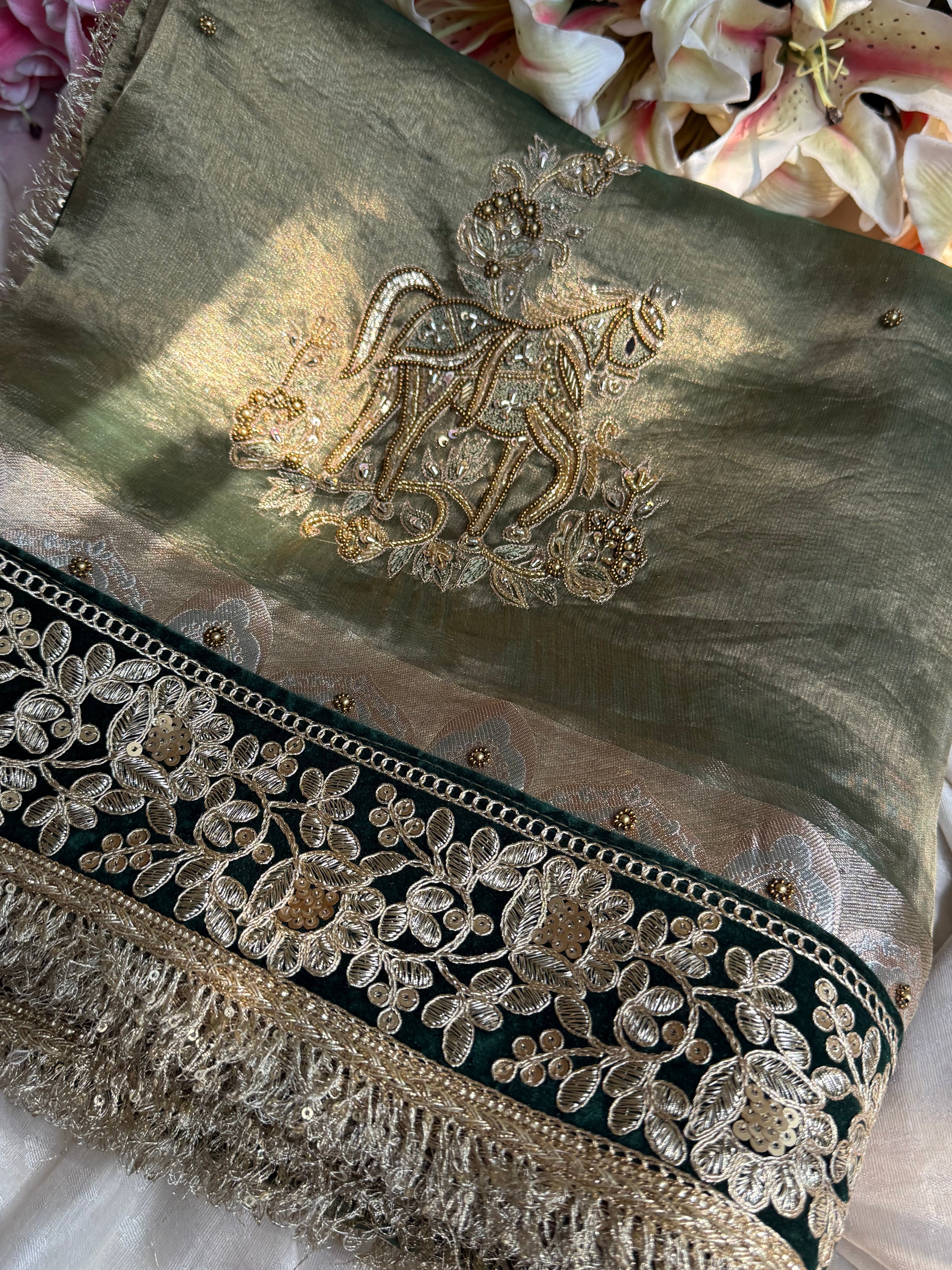 सुनहरा घोड़ा-  Royal horse motif tissue silk mint green hand embroidered saree