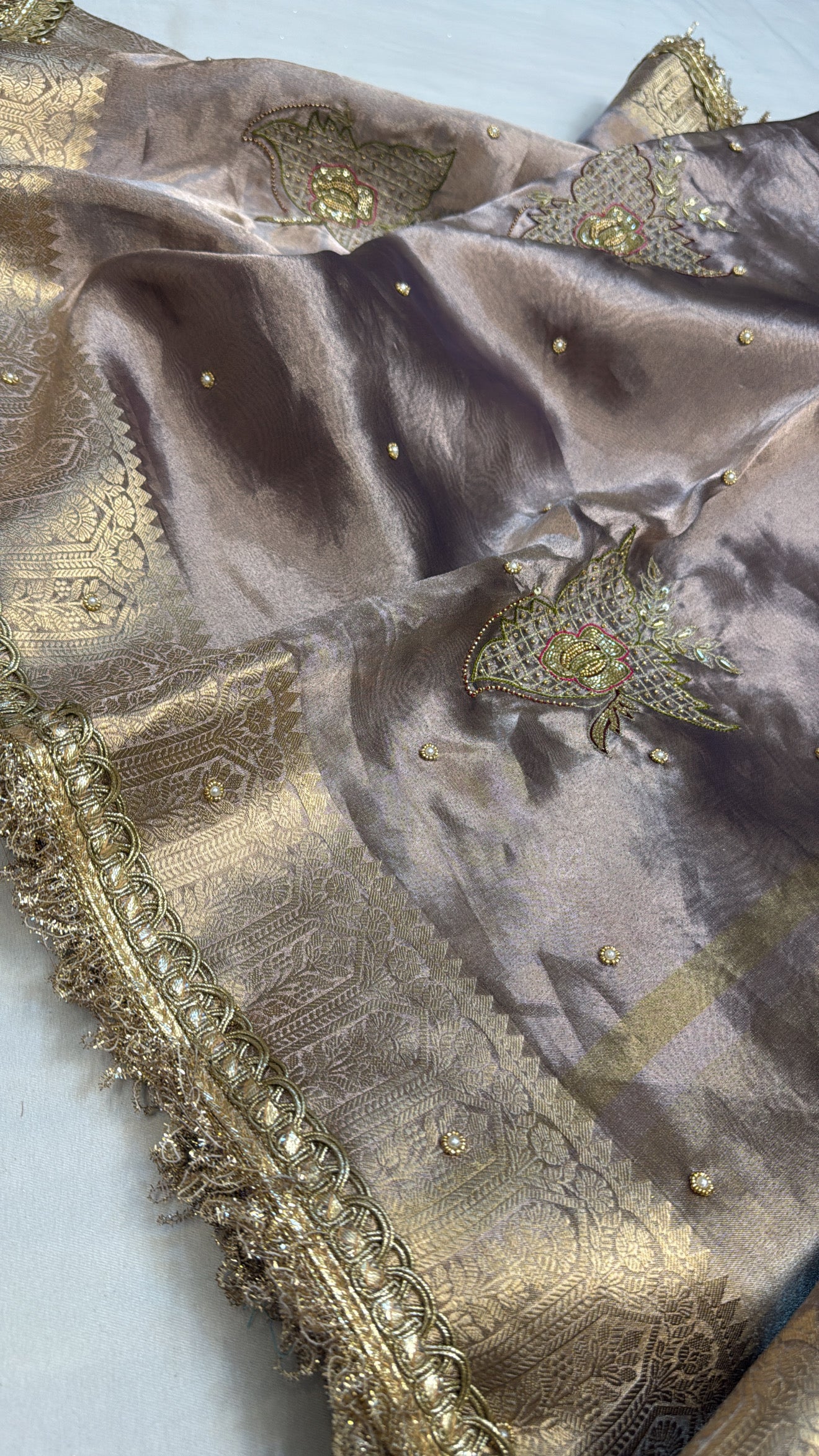 Husn ice silver tissue silk hand embroidered saree