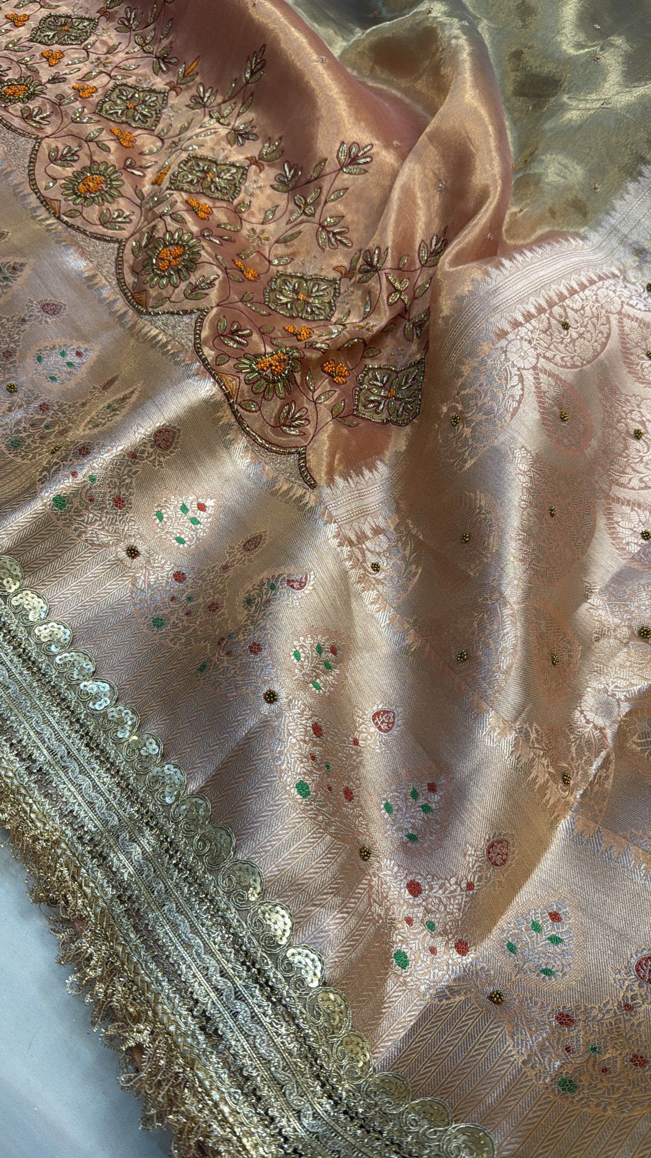 Blush peach tissue silk hand embroidered meenakari saree