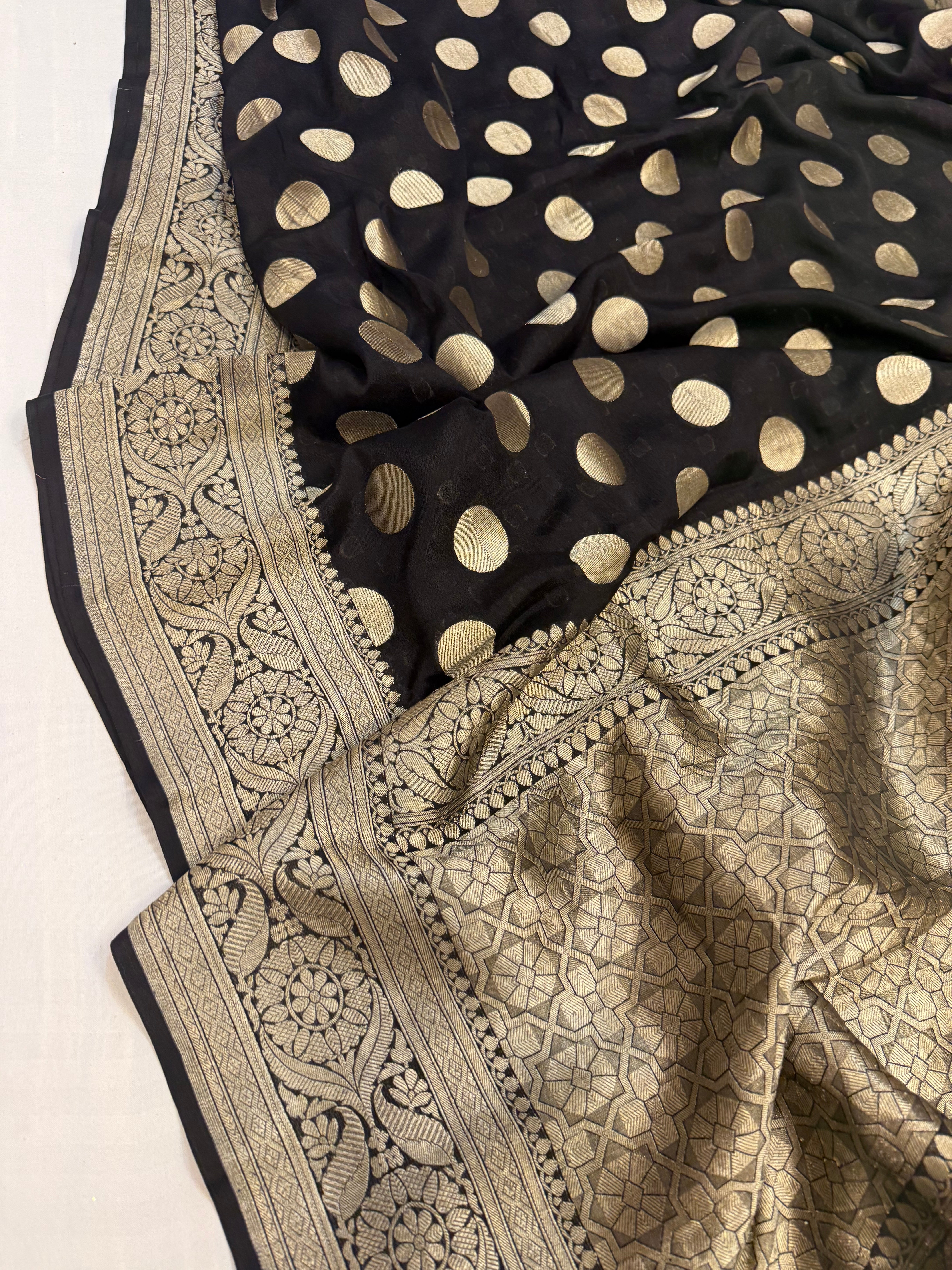 Black pure banarasi gorgette kadhwa round buti saree