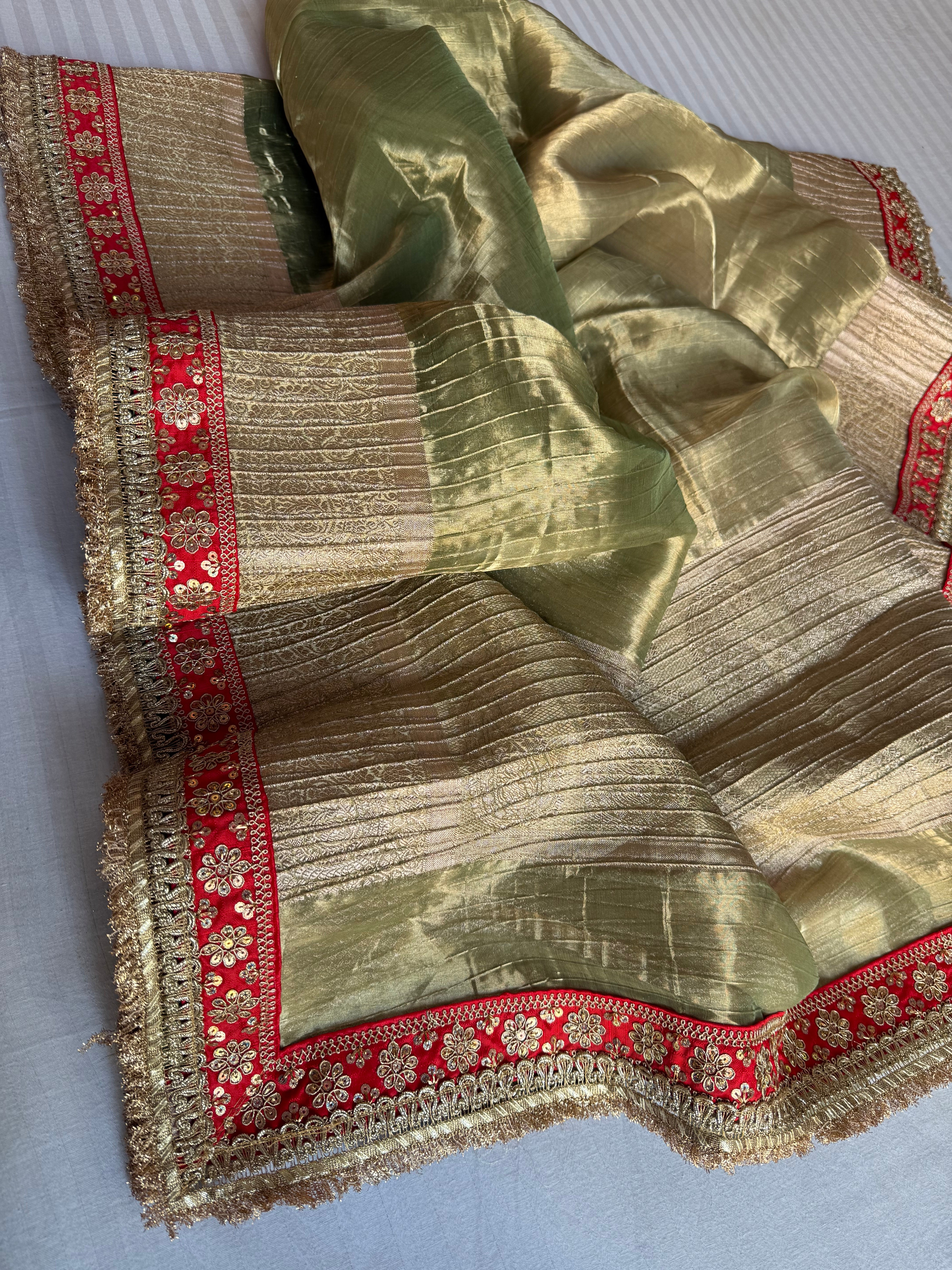 Mint green pleated maharani tissue silk kadhwa saree