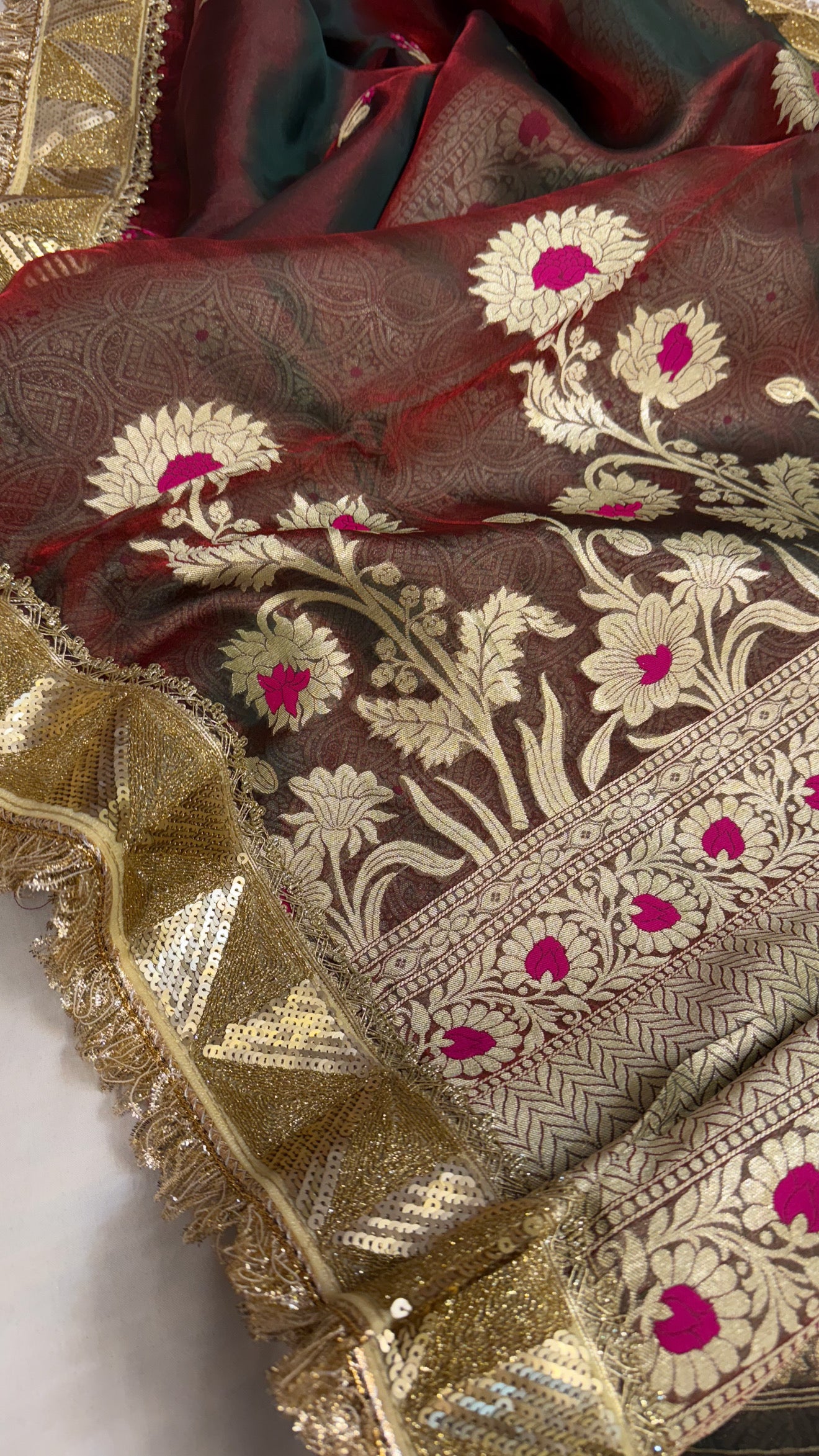 Maharani blood red dhup chao effect tissue silk meenakari saree