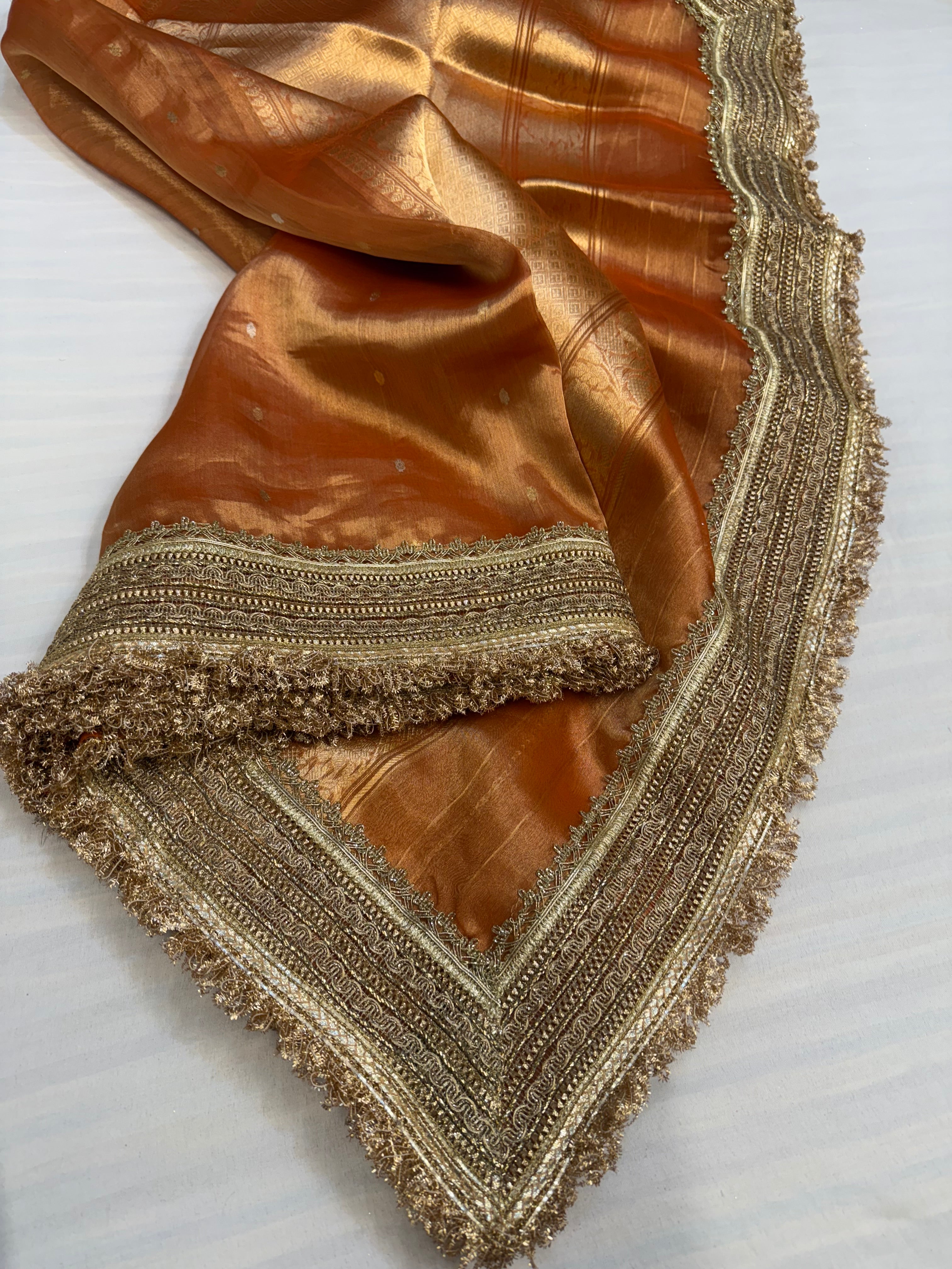 Fanta orange maharani tissue silk kadhwa buti saree