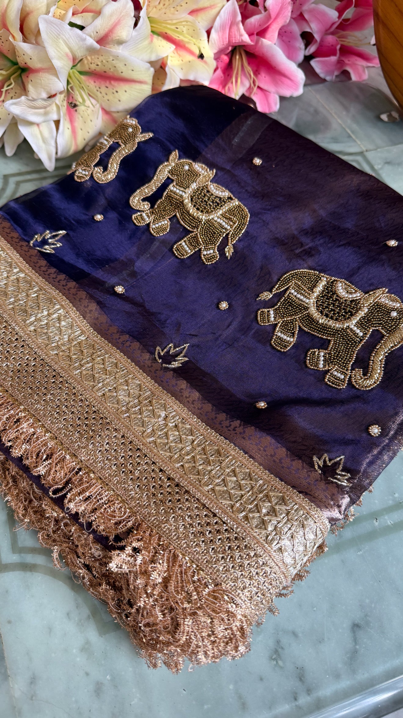 Husn midnight blue tissue silk hand embroidered elephant motif saree