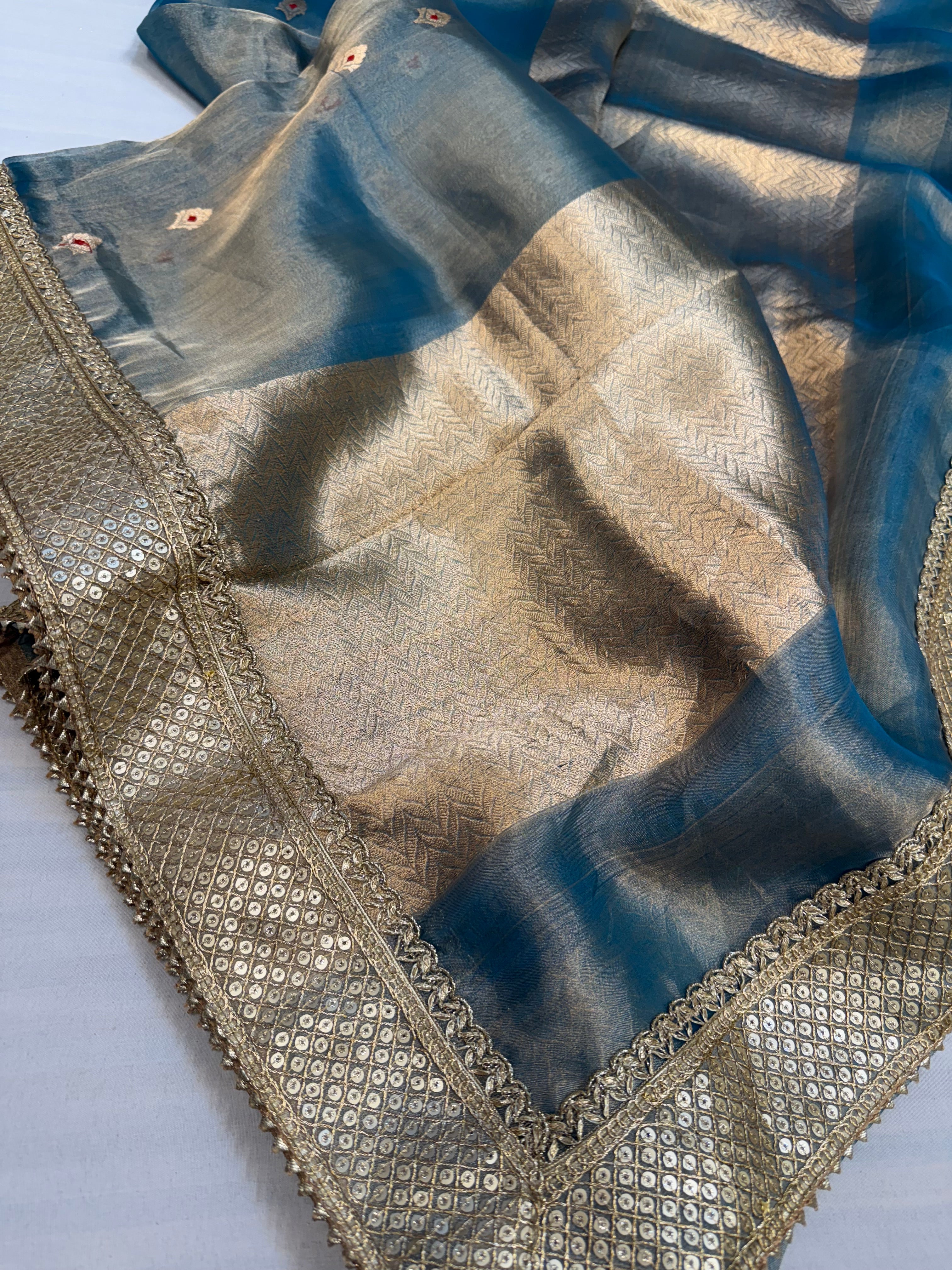 Aqua blue maharani tissue silk meenakari buti saree
