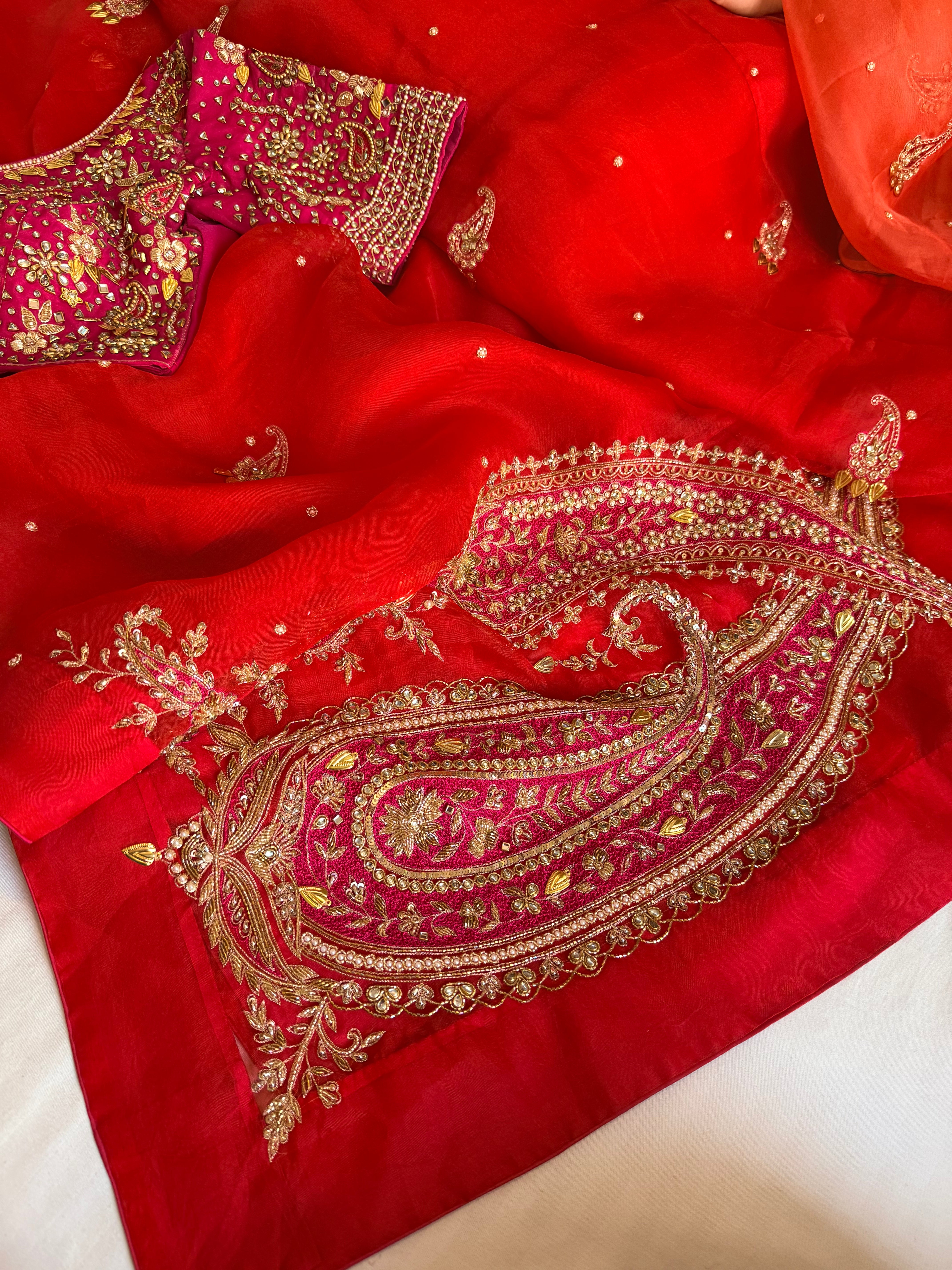 Traditional carry motif - rani and red combination kora silk hand embroidered saree