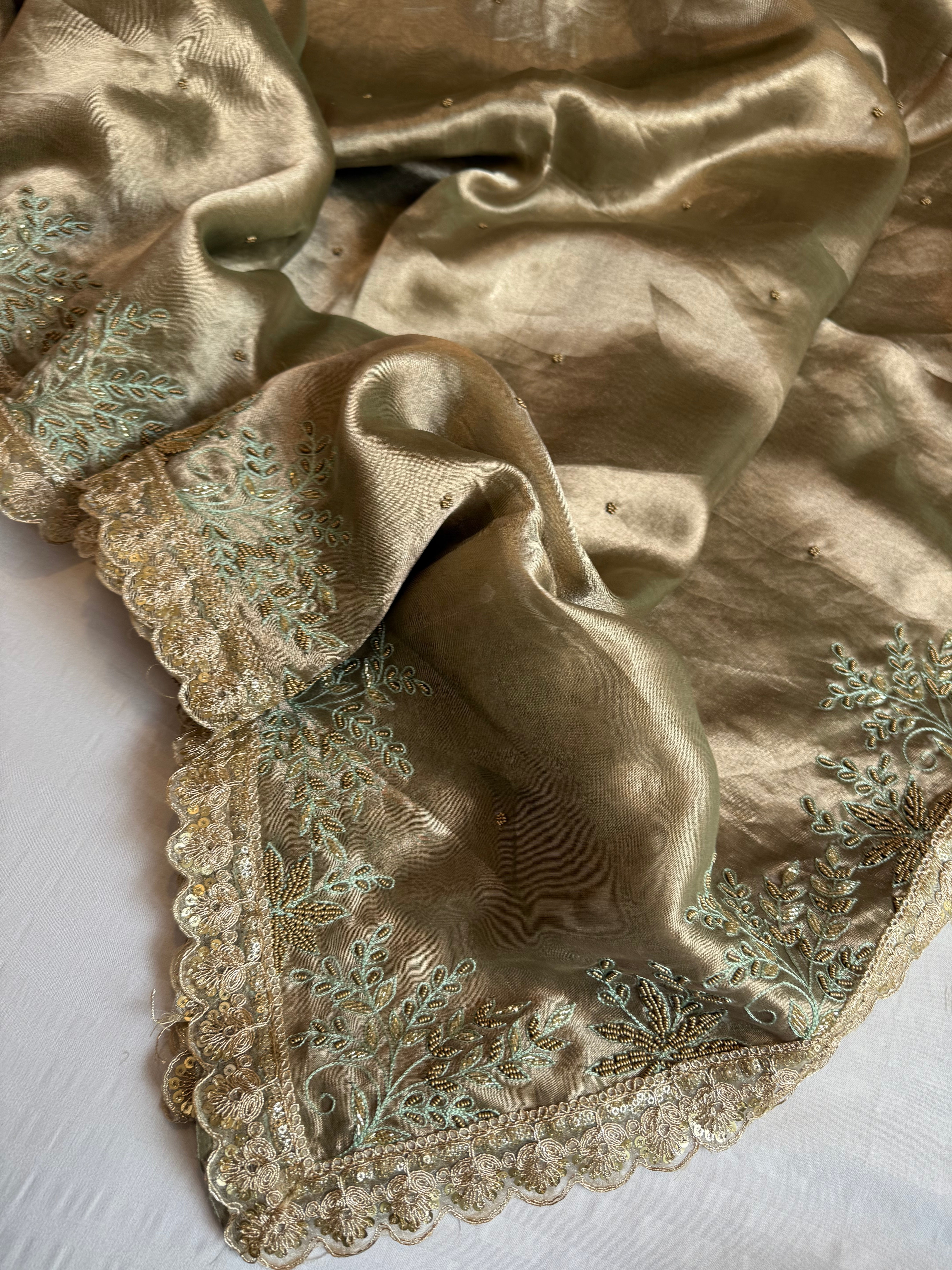 Husn tissue silk sage green heavy zardozi hand embroidered saree