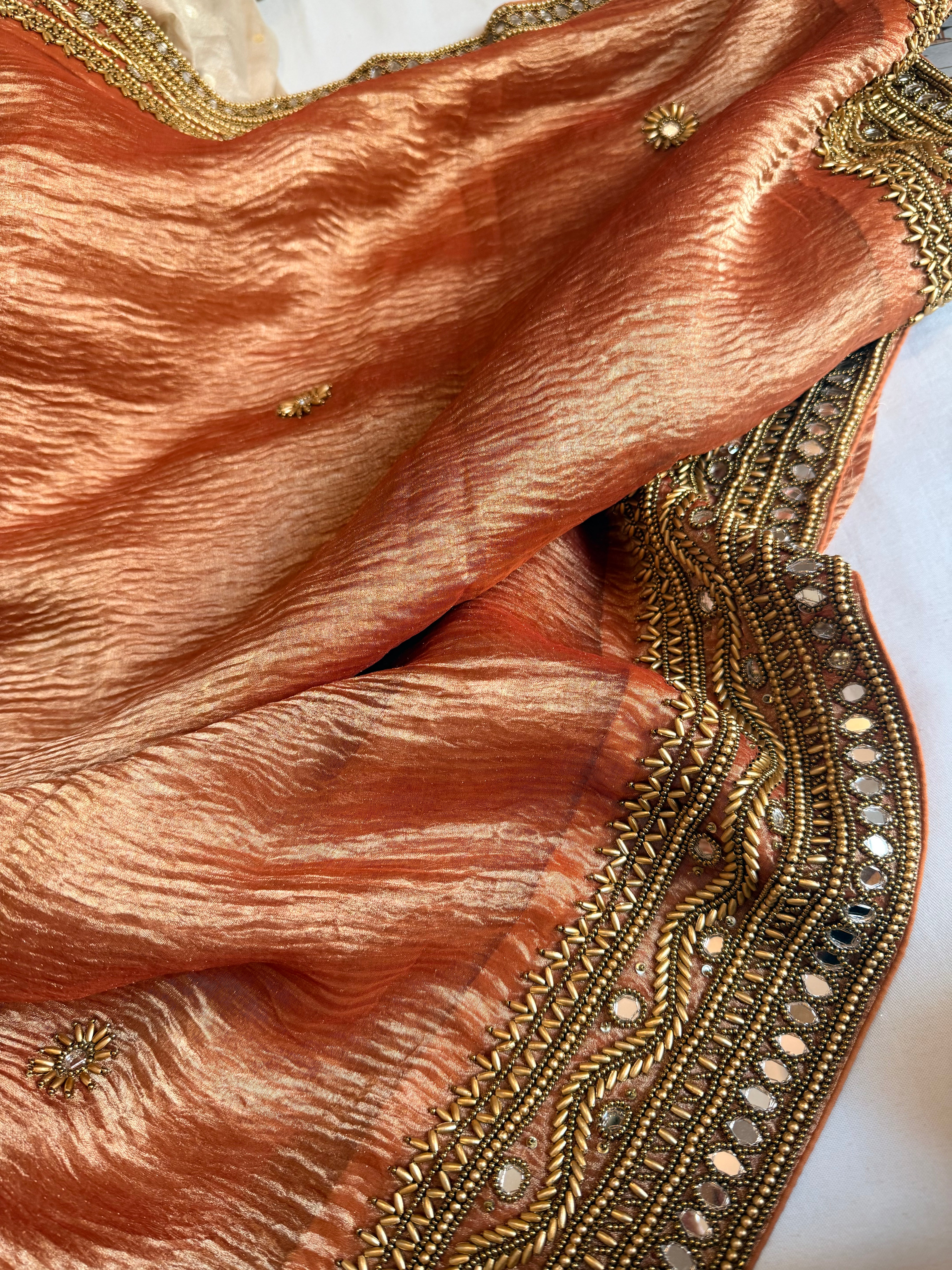 Rajkumari gajri crushed tissue silk hand embroidered kadhwa saree