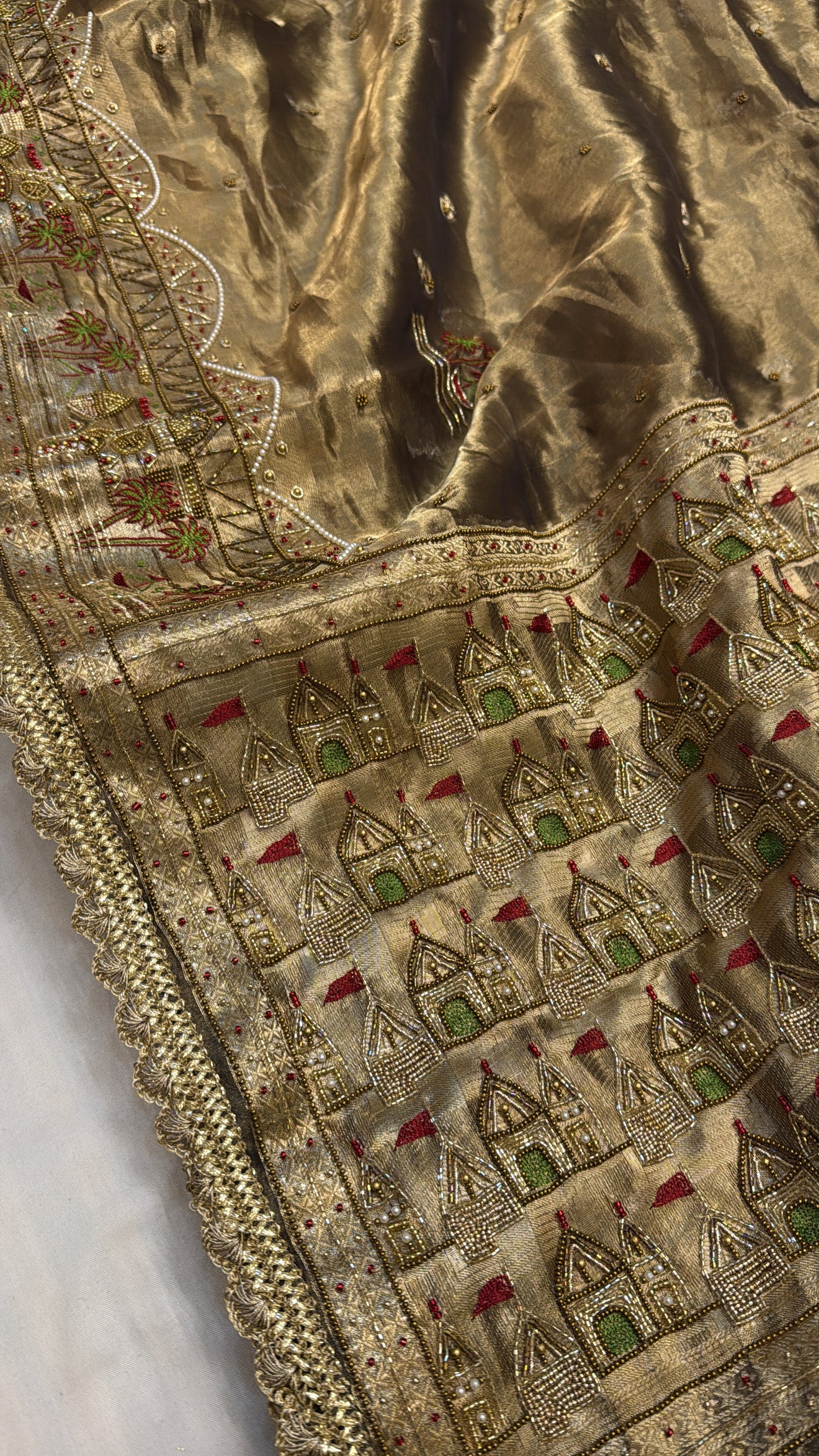 Gangakinare edit molten gold tissue silk hand embroidered saree