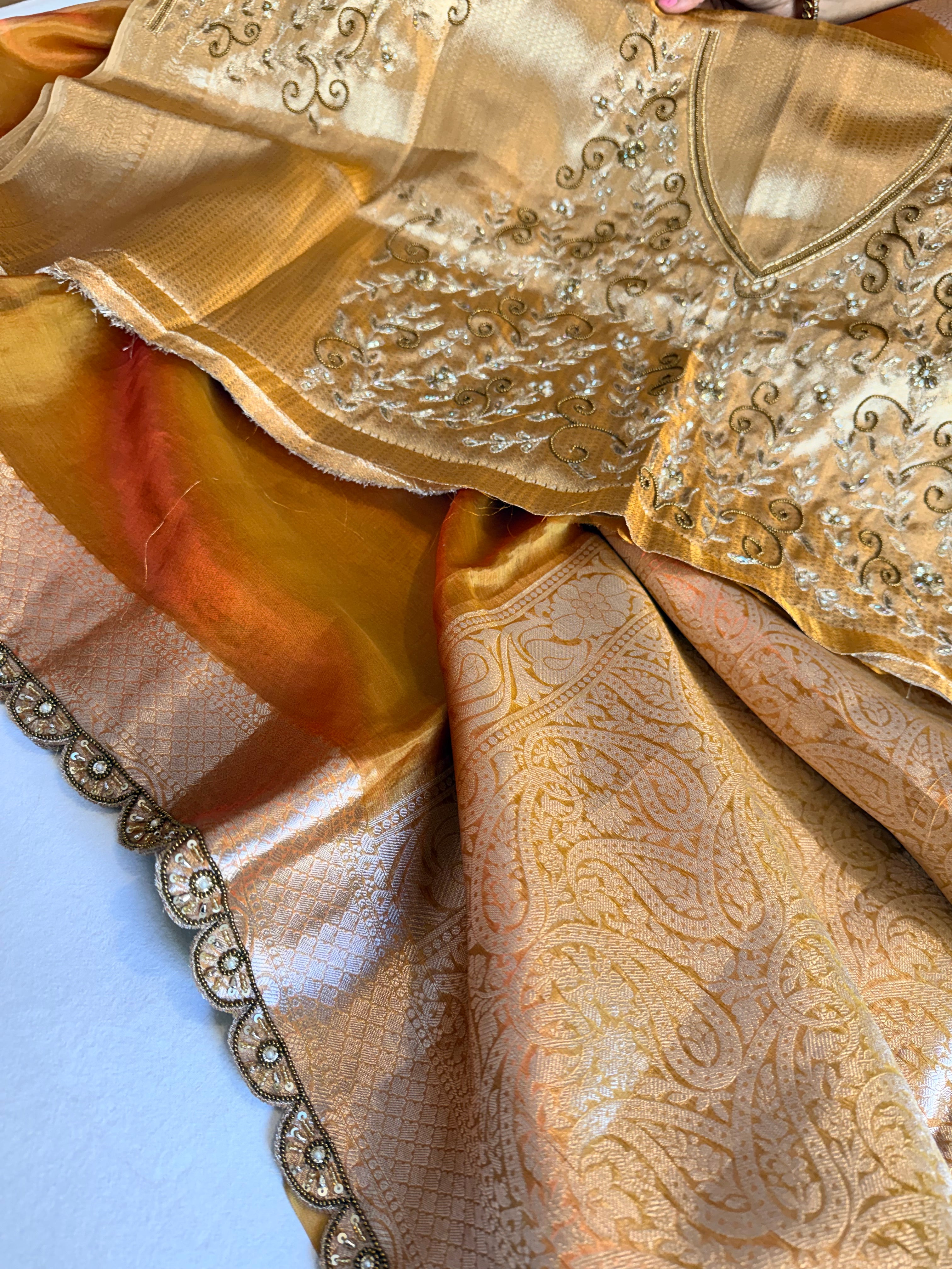 Sunset orange husn tissue silk hand embroidered saree with heavy blouse