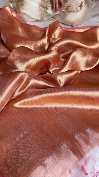 Pinkish-orange dhup-chao effect tissue brocade kadhwa saree