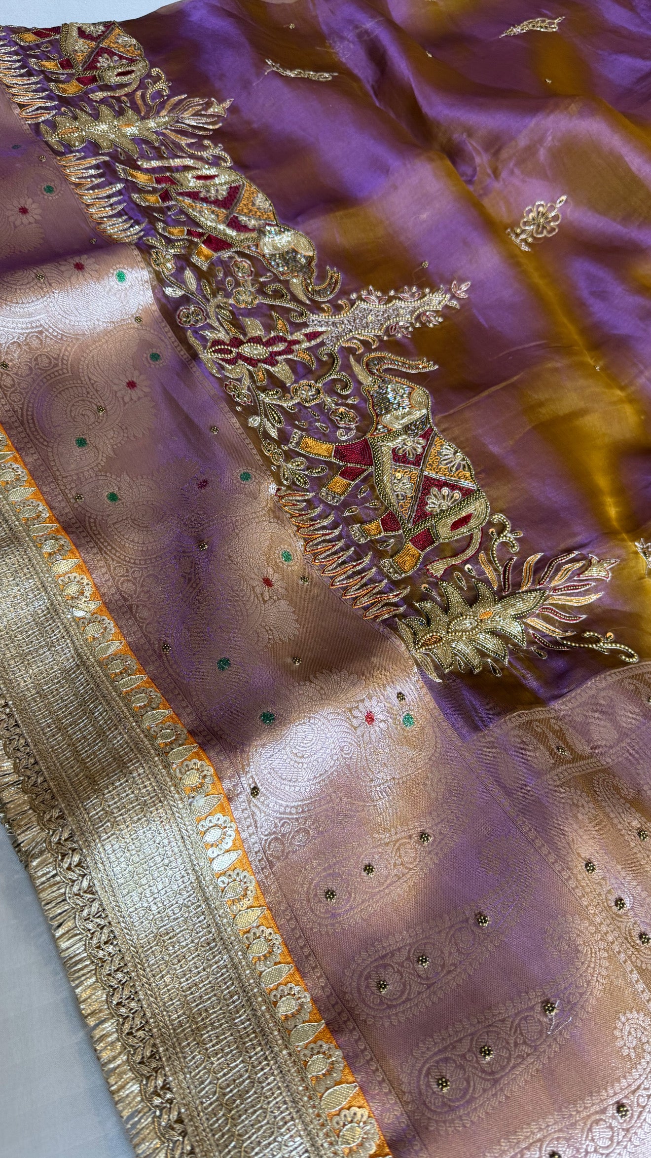 Elephant motif lavender tissue silk hand embroidered kadhwa saree
