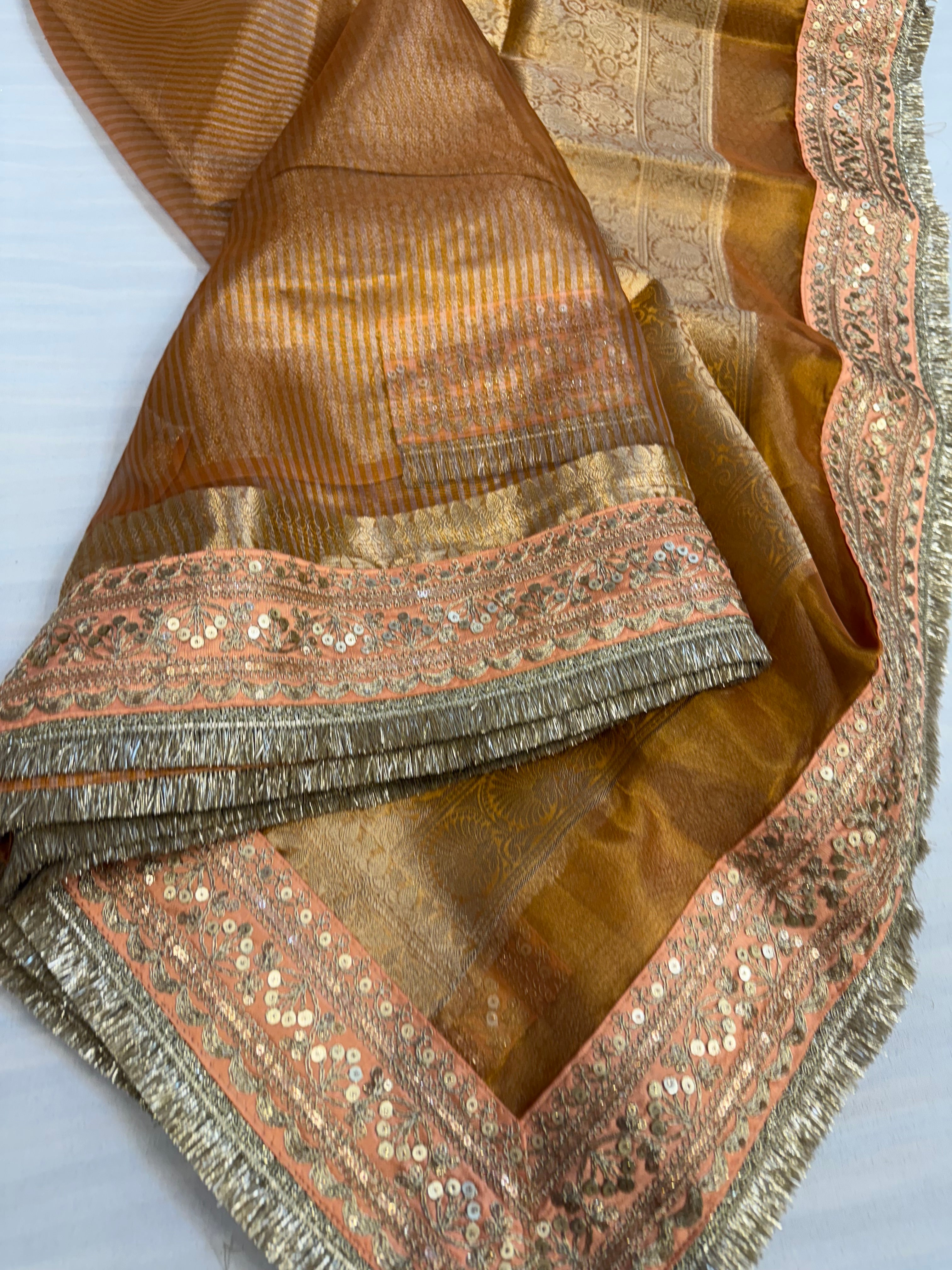 Fanta orange maharani tissue silk striped kadhwa saree