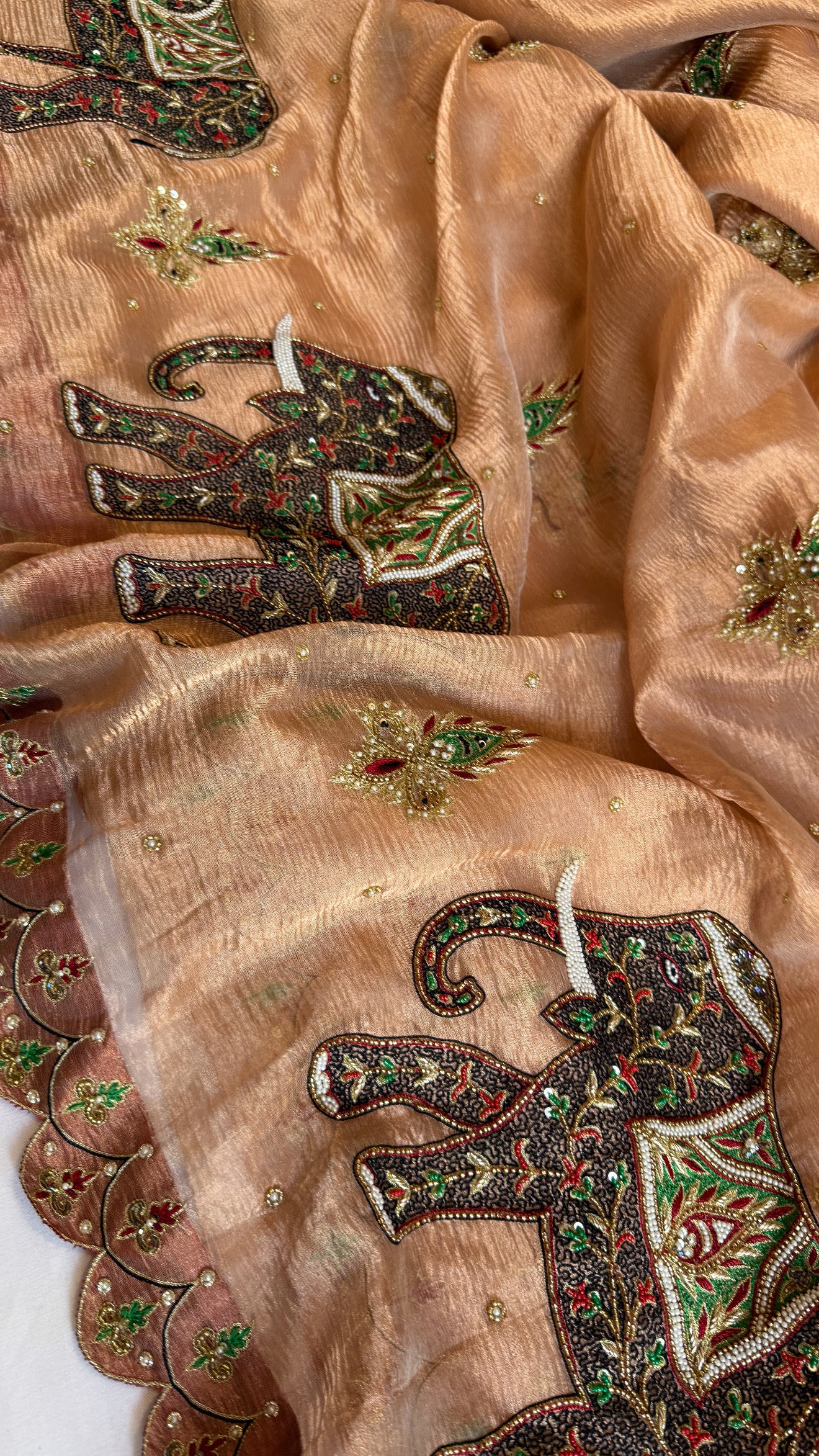 GajGamini copper crushed tissue silk elephant motif heavy hand embroidered saree
