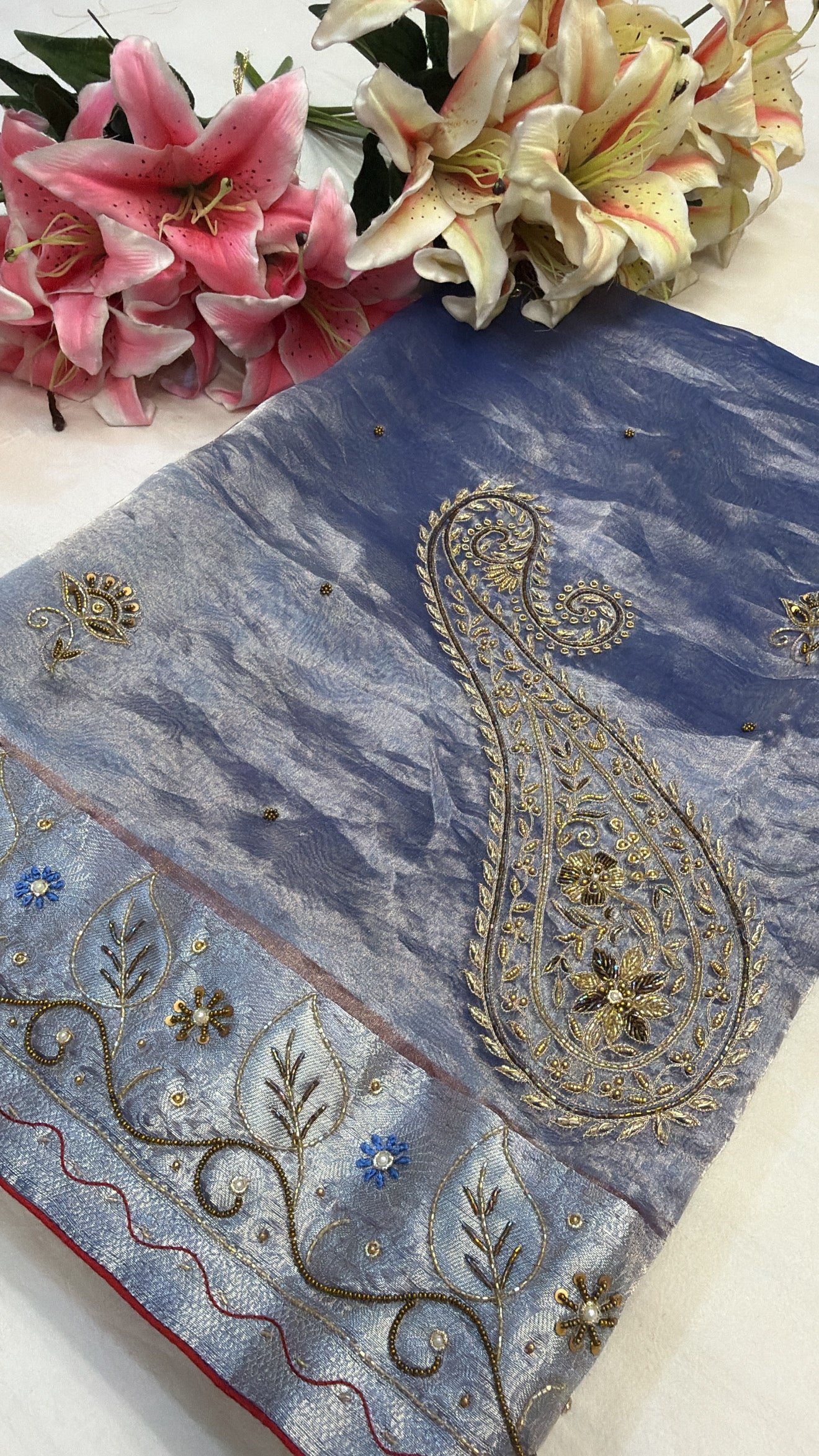 Persian blue husn tissue silk carry motif hand embroidered saree