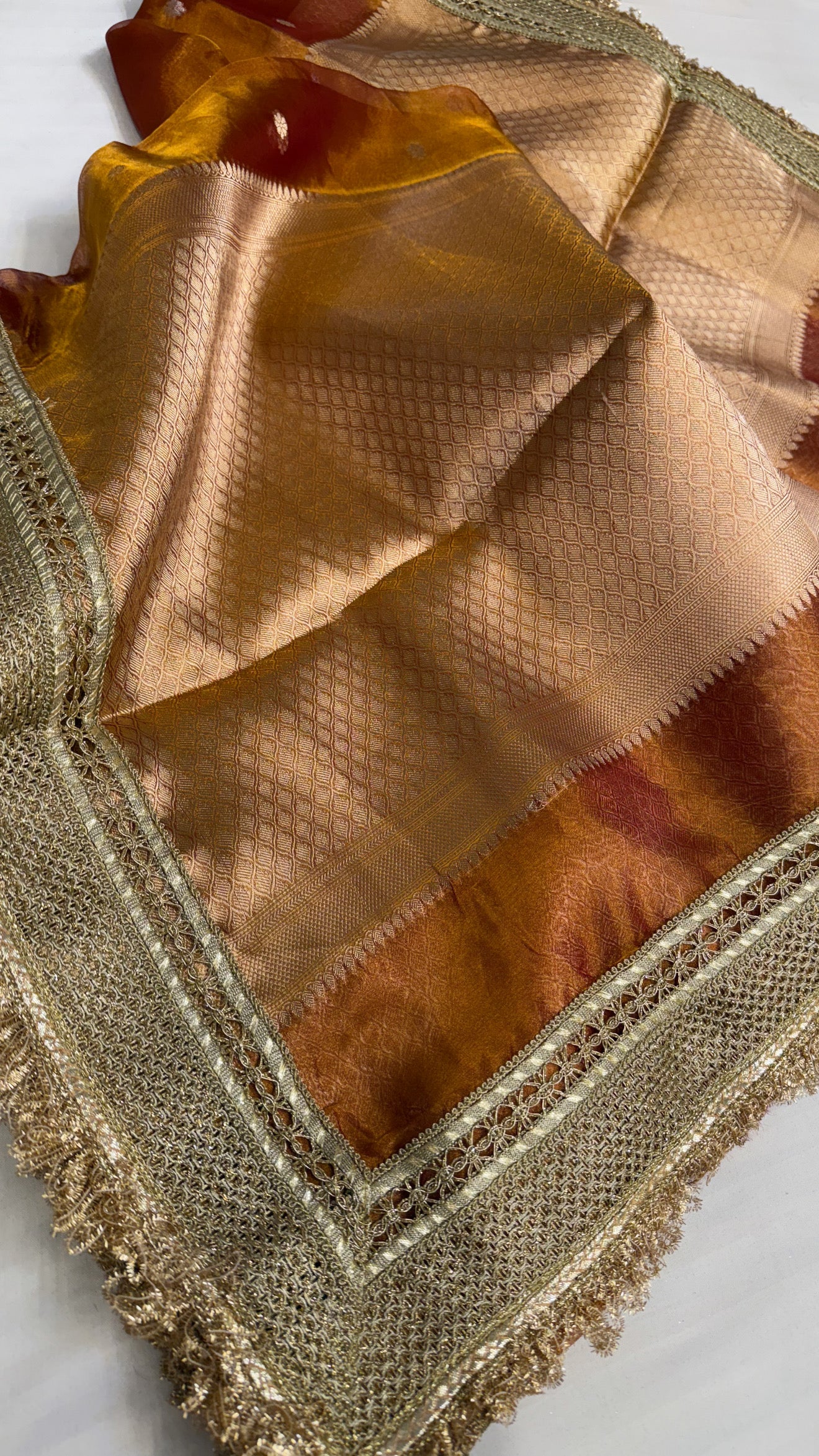 Maharani burnt orange tissue silk kadhwa buti saree