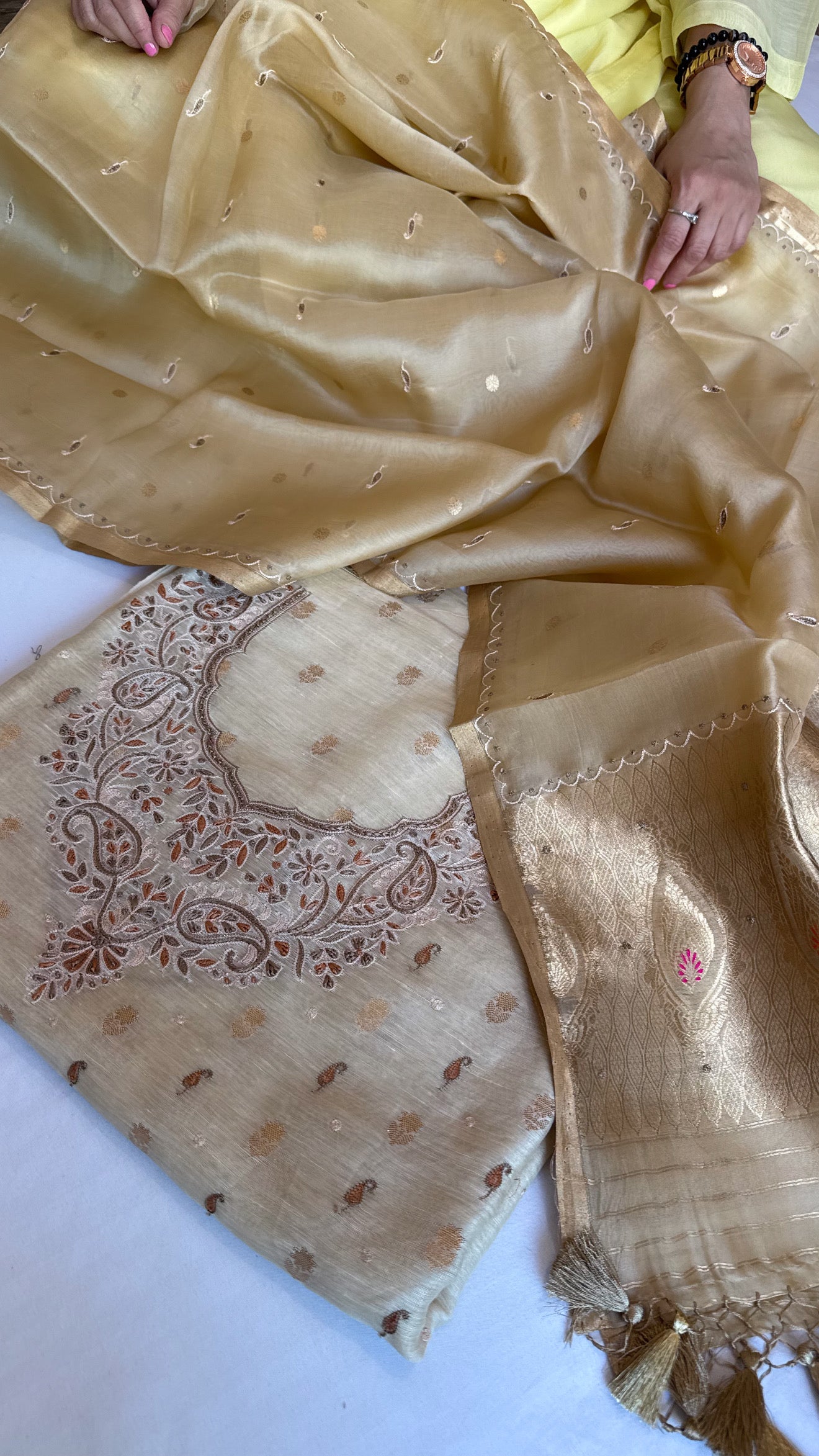 Soft gold resham hand embroidered linen gorgette kurta paired with kora silk duppata