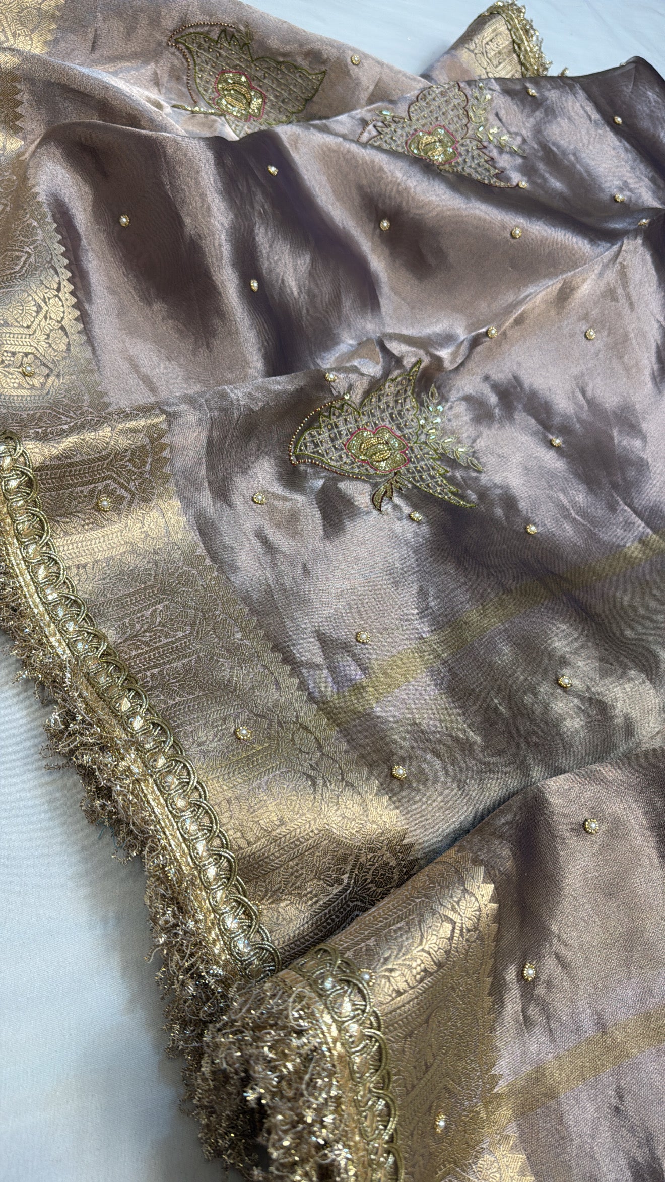 Husn ice silver tissue silk hand embroidered saree