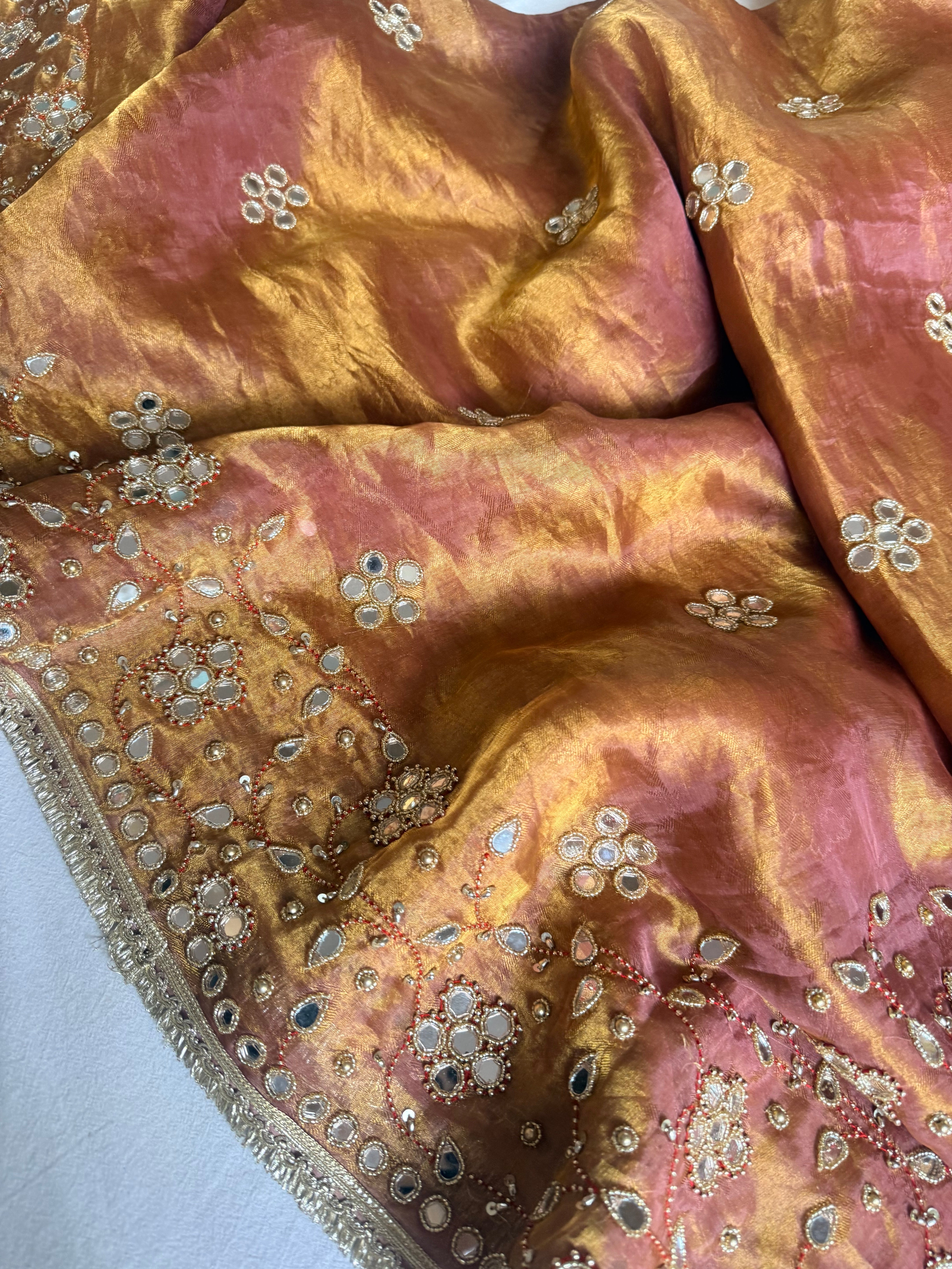 Molten pink tissue silk mirrorwork hand embroidered saree