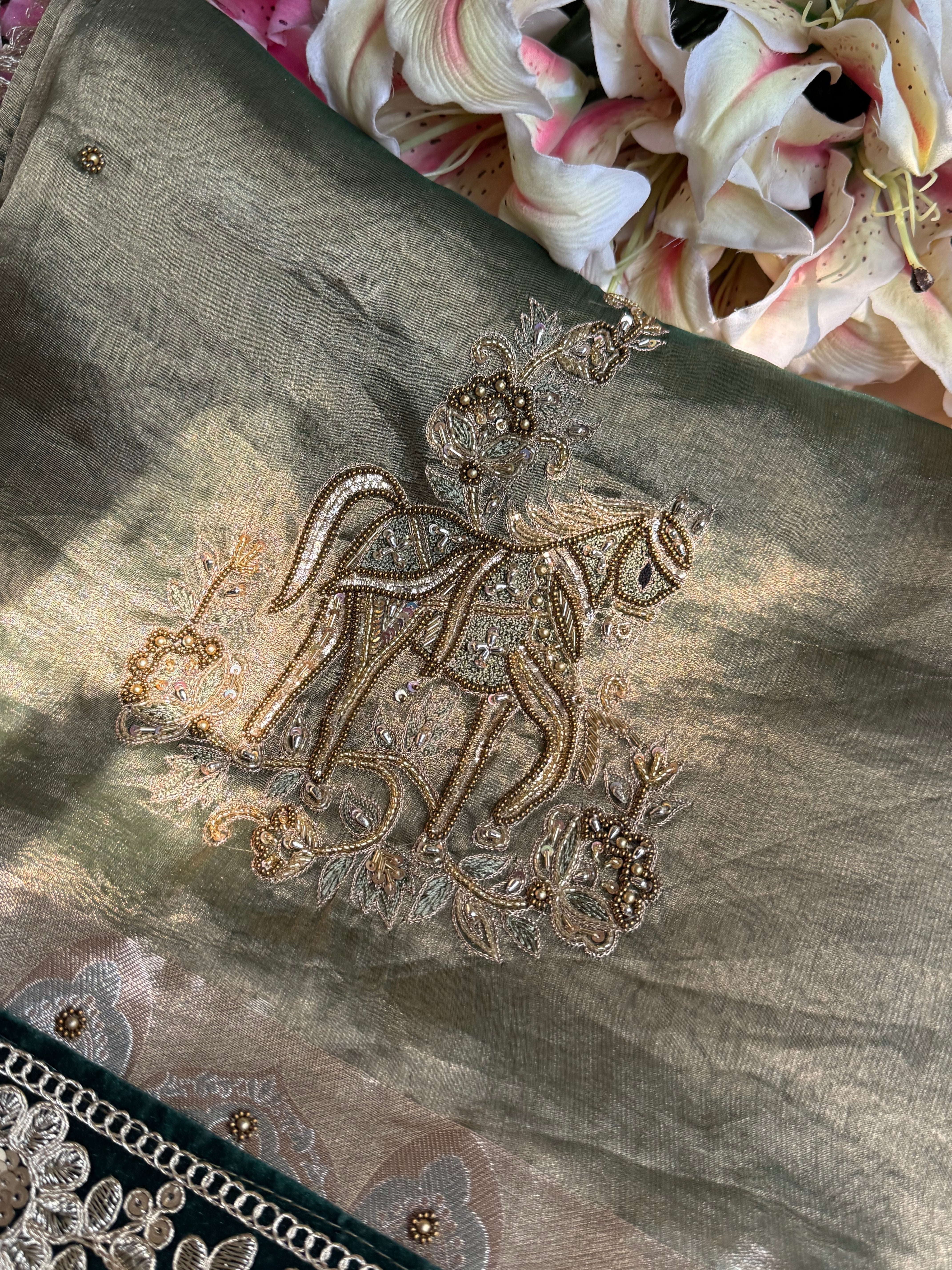 सुनहरा घोड़ा-  Royal horse motif tissue silk mint green hand embroidered saree