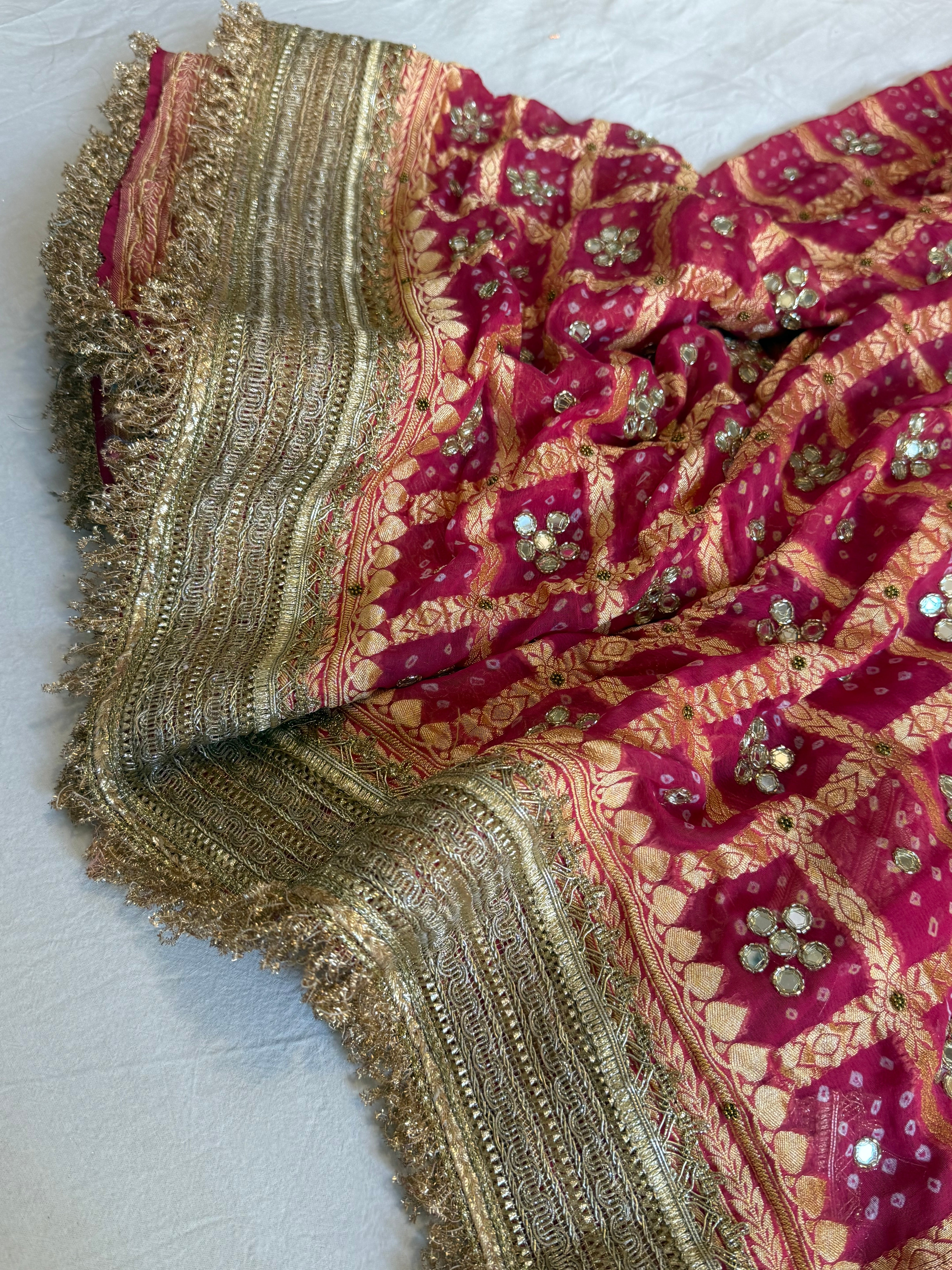 Cherry pink rai bandhej mirror work banarasi gorgette saree with long latkans