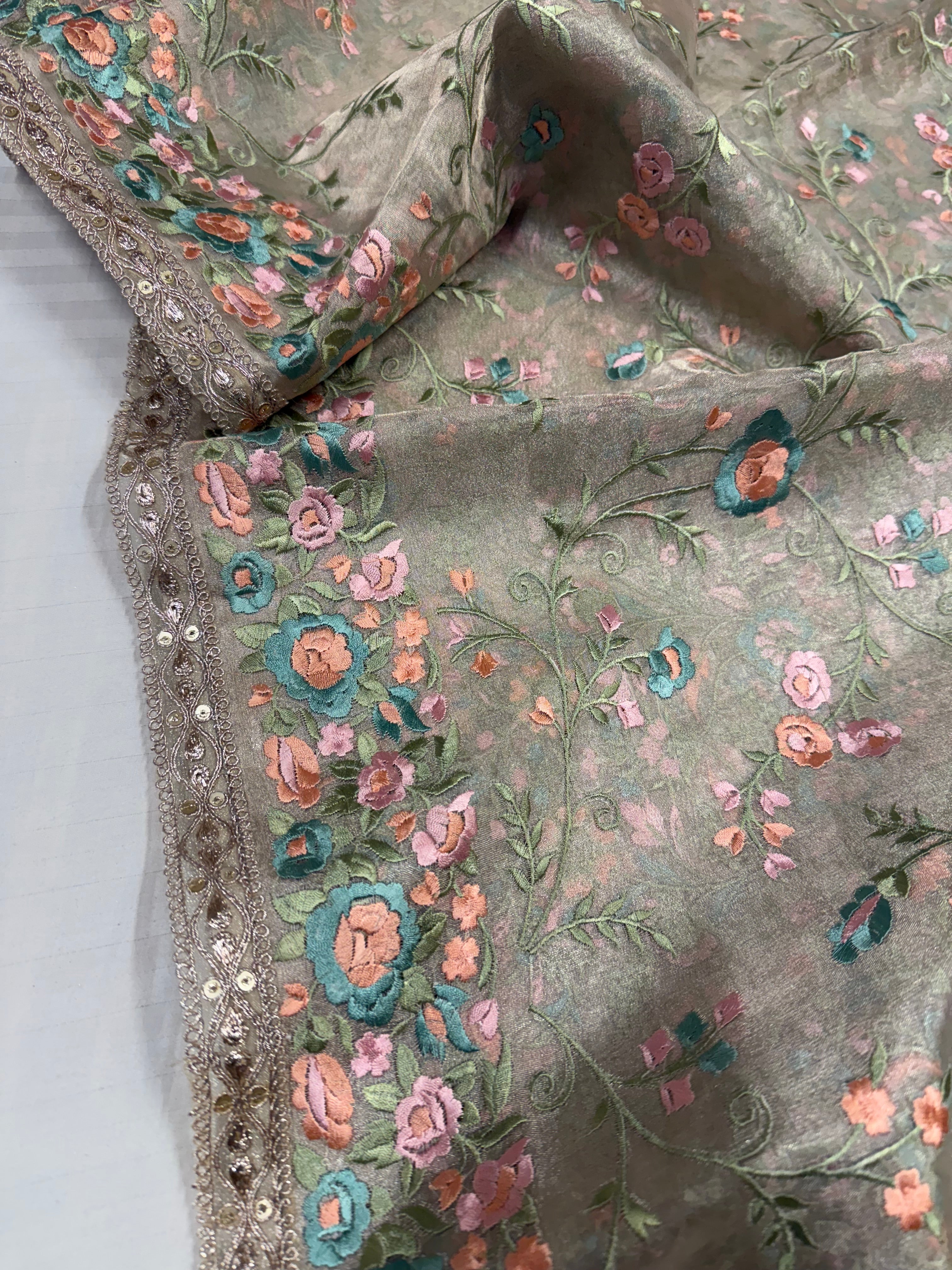 “Parsi gara” inspired tissue silk heavy resham work hand embroidered saree