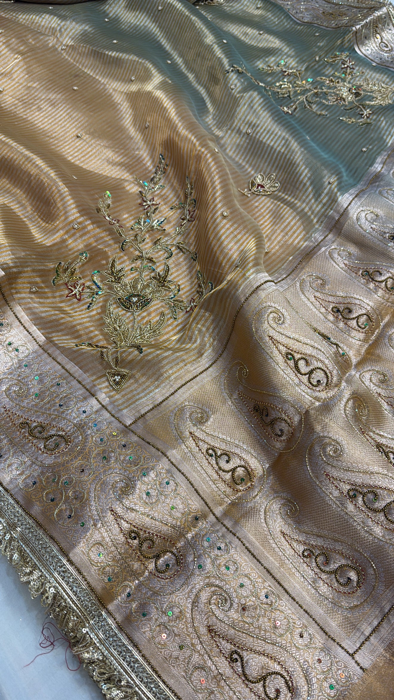 Beige-blue ombre shaded tissue silk hand embroidered saree