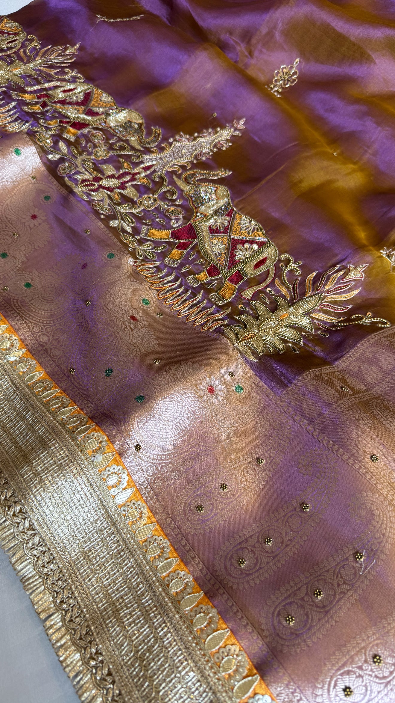 Elephant motif lavender tissue silk hand embroidered kadhwa saree
