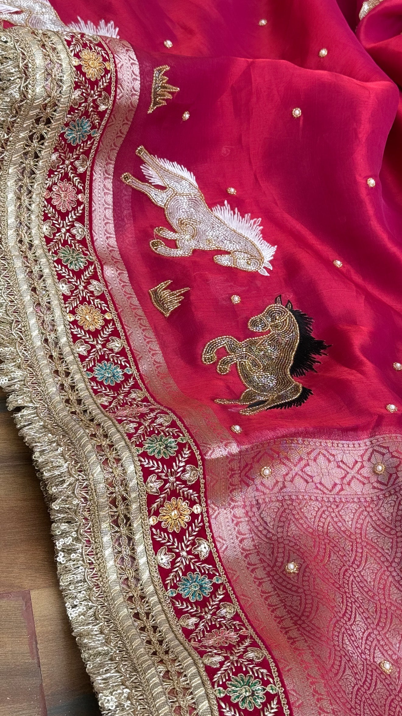 Horse hand embroidered motif cherry pinkish red dhup chao effect tissue silk banarasi gotapatti kadhwa saree