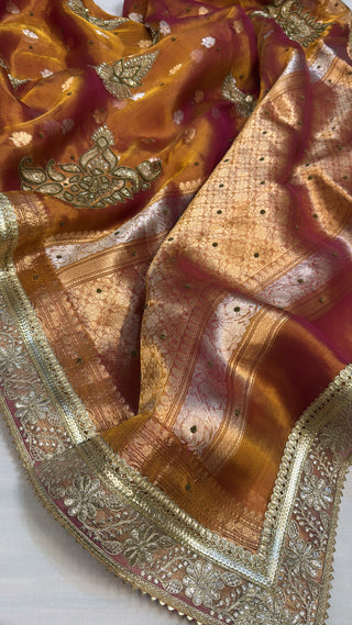 Dulhan wali saree - Orange pink dhup chao effect tissue silk hand embroidered saree