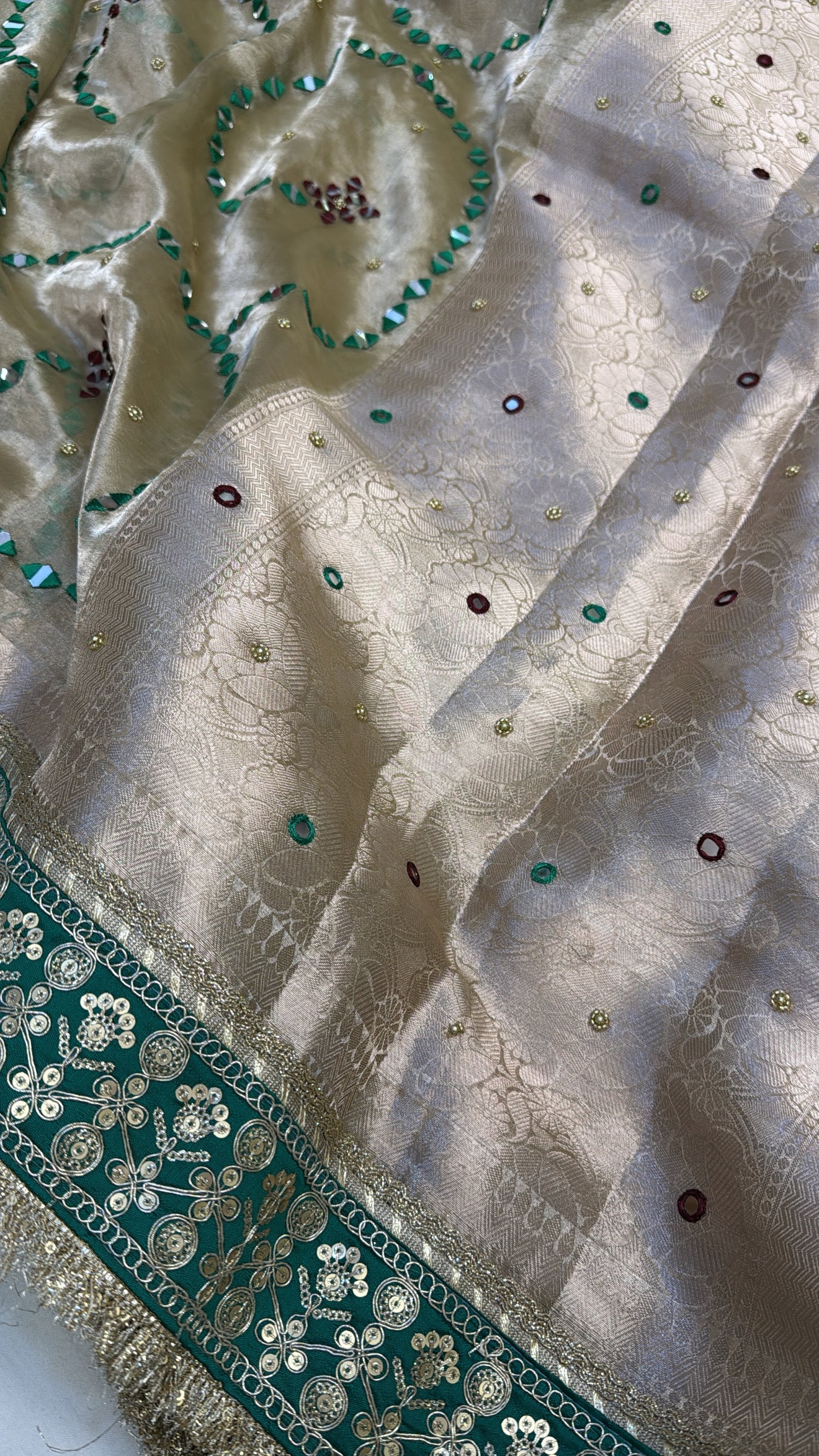 Champagne gold with green mirror work husn tissue silk hand embroidered kadhwa saree