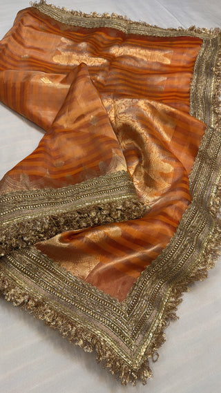 Maharani chuski fanta orange tissue silk striped saree