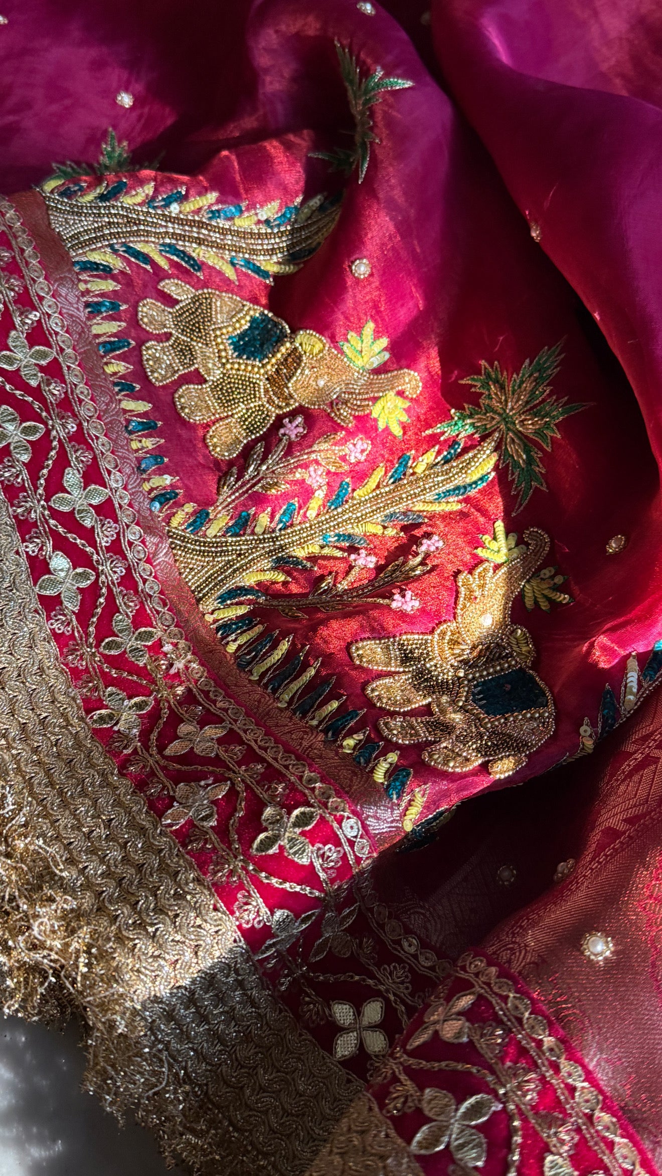 Teej special - Cranberry red tissue silk elephant motif hand embroidered kadhwa saree