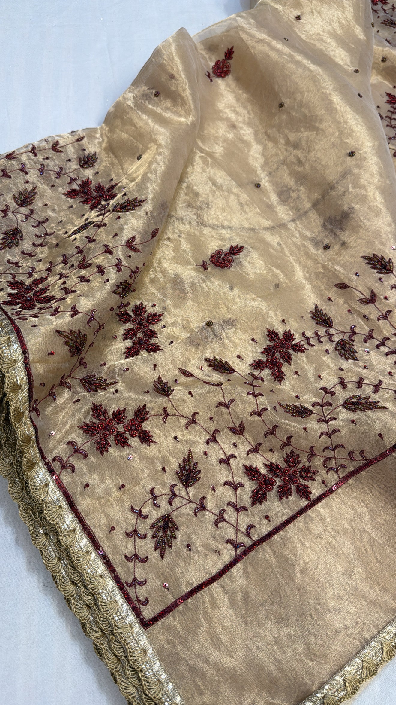 Golden husn tissue silk red meenakari hand embroidered kadhwa saree