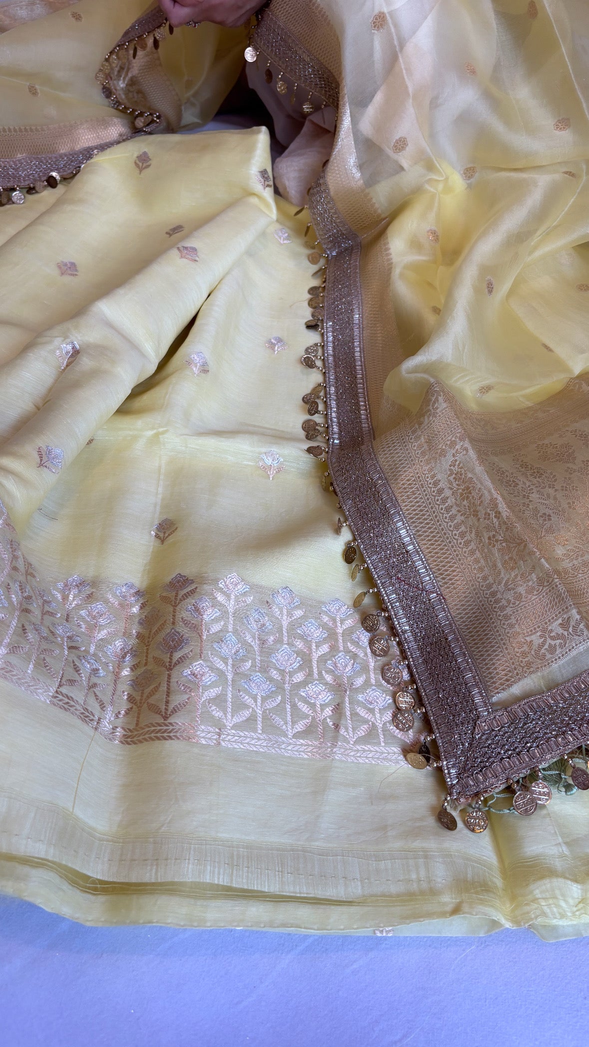 Soft lime linen gorgette kurta paired with kora silk hand woven duppata sets