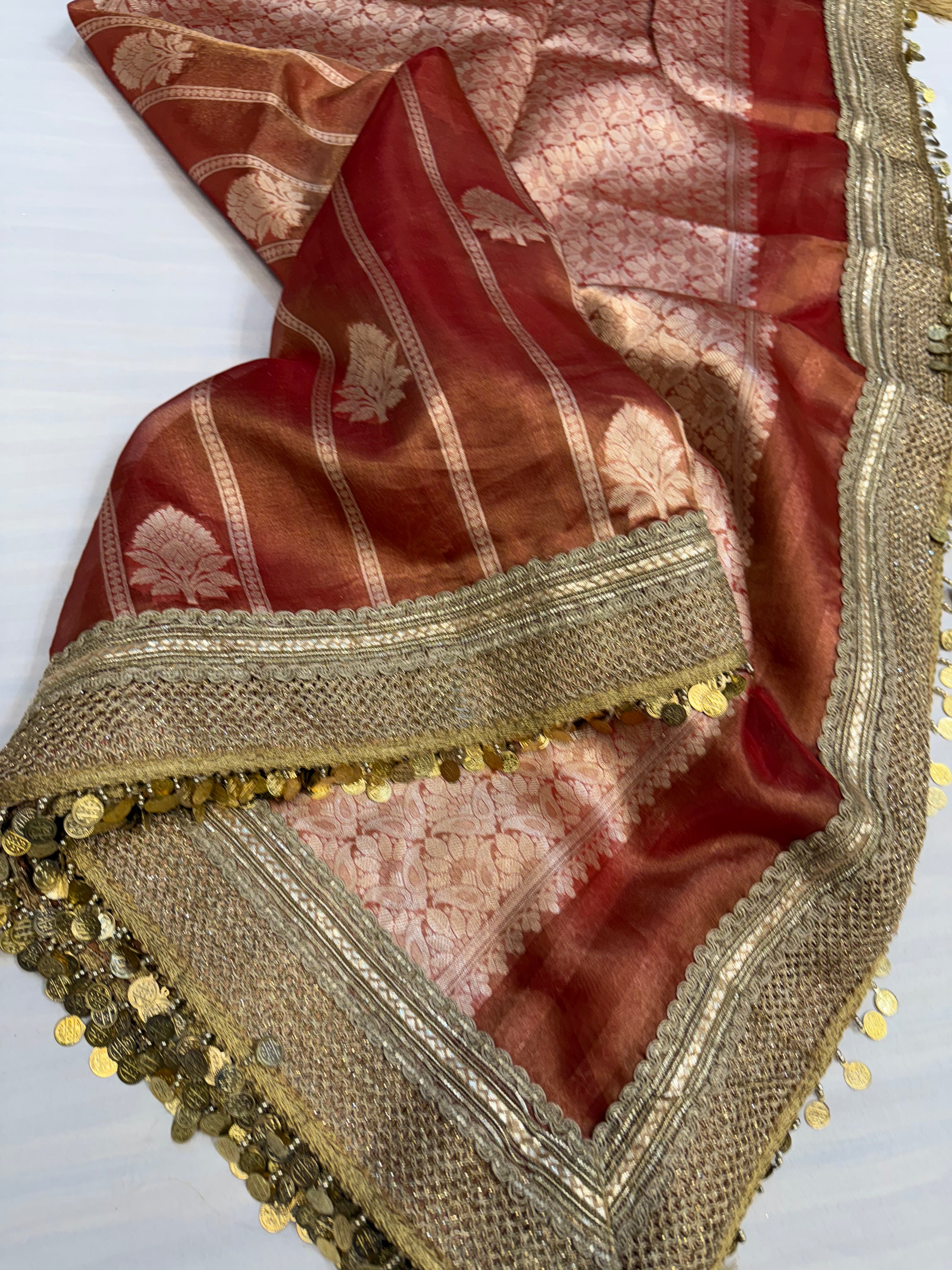 Maroonish red maharani tissue silk kadhwa saree
