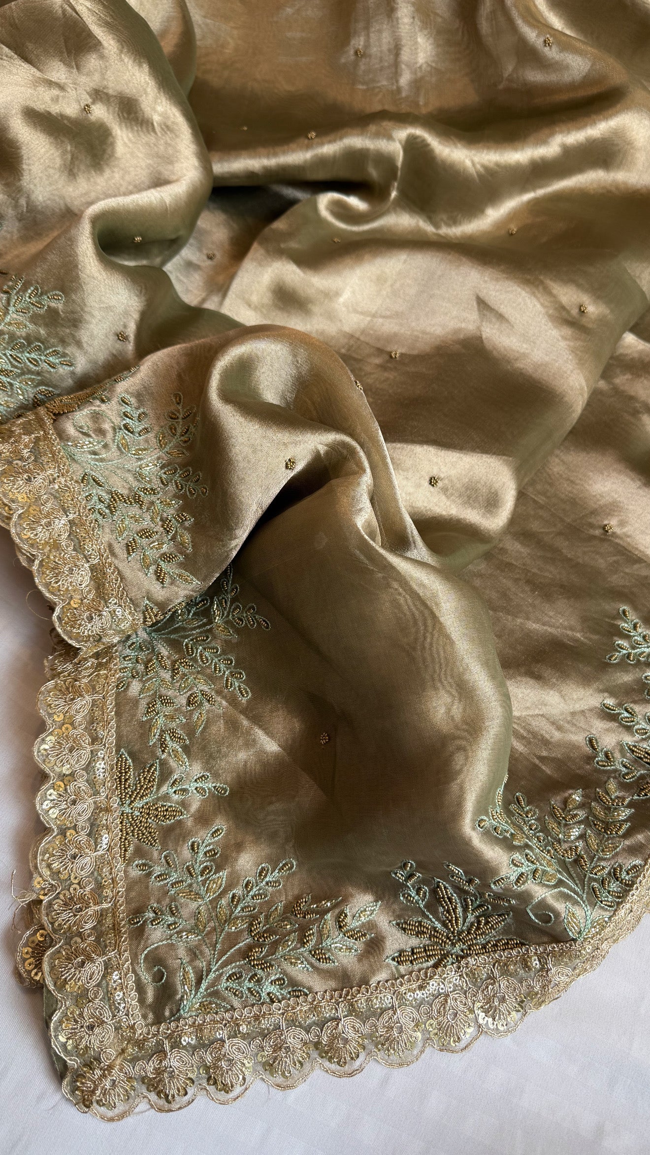 Husn tissue silk sage green heavy zardozi hand embroidered saree